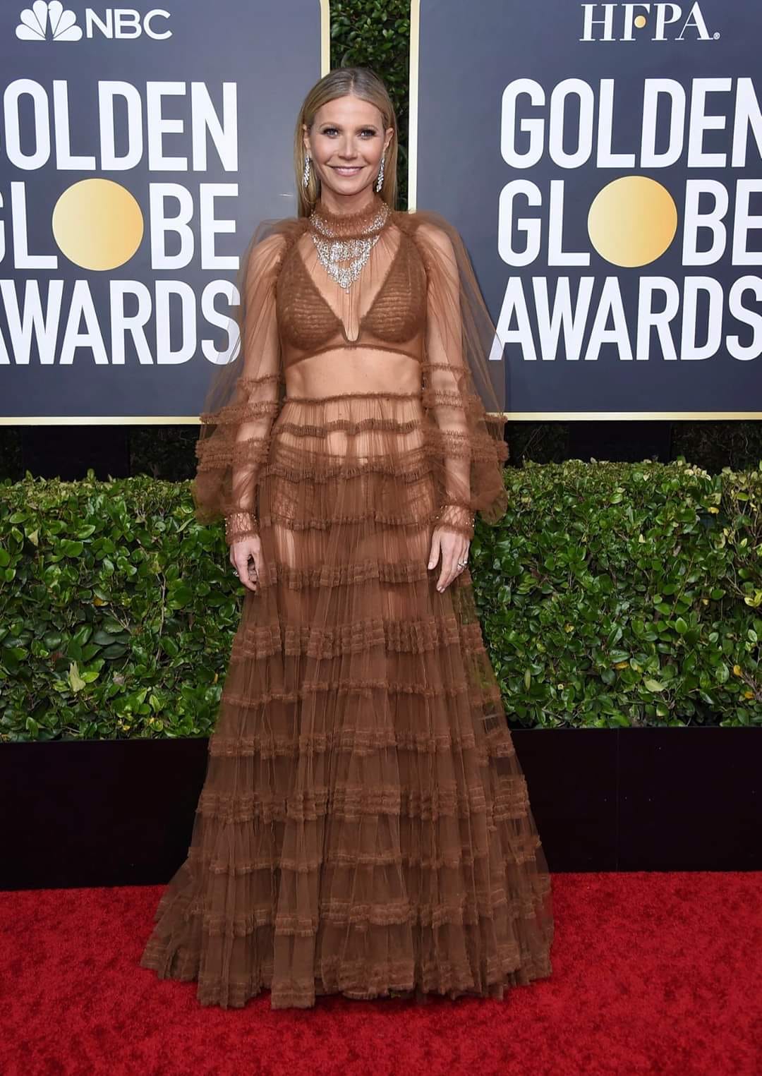 gwyneth paltrow brown dress wears a custom drop-waist in black sequined lace, paired with black satin naked bow sandals, to the 32nd Annual Actor Awards. Givenchy by Sarah Burton Color:Brown, Bronze Sale Styles Five Brown Leather Jacket Green dress