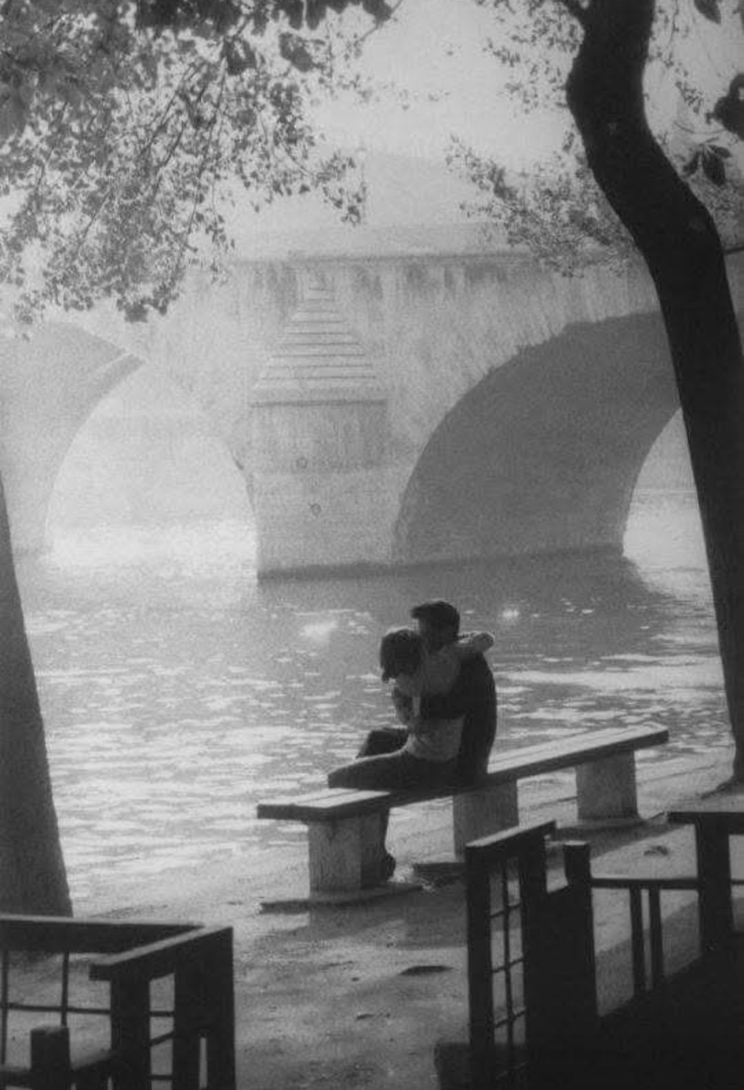 A Street Scene, Paris 1957. Photo by Willy Ronis
