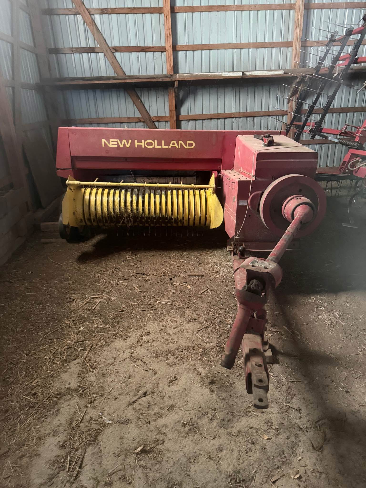 New Holland 315 small square baler, 2-16ft hay racks and 15 new rolls ...