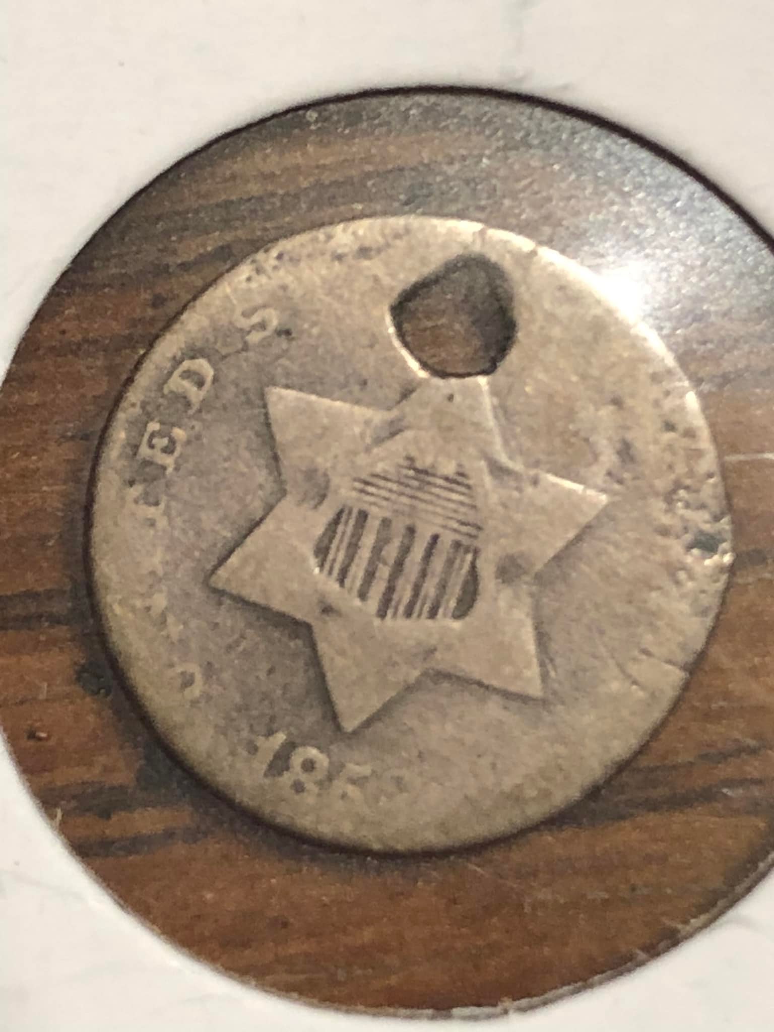 Is this a 1852 American 3 cent coin?
