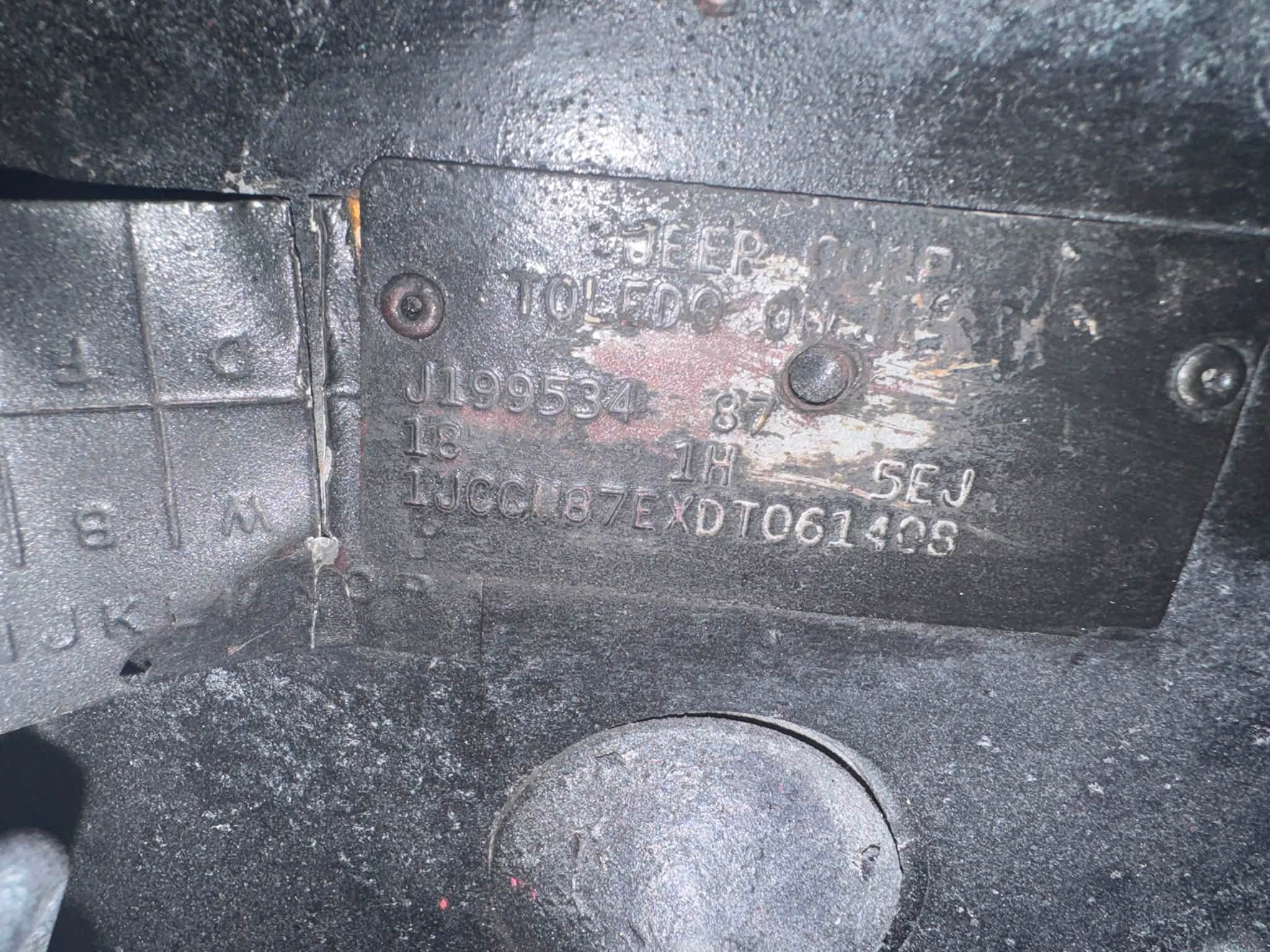 What is the trim package for a 1987 Jeep CJ7 with VIN 87EXD0614?