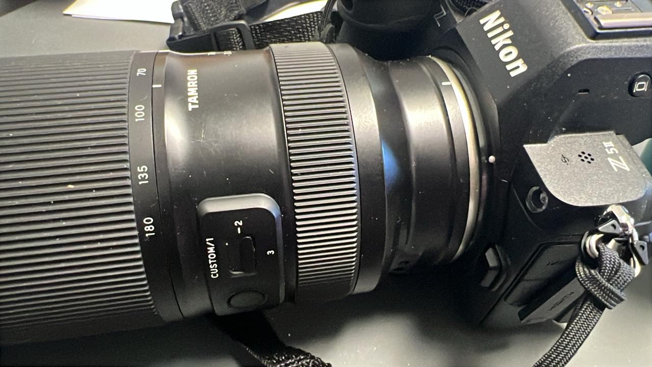 Where to find instructional videos for Tamron 70-180mm 2.8 G2 lens?