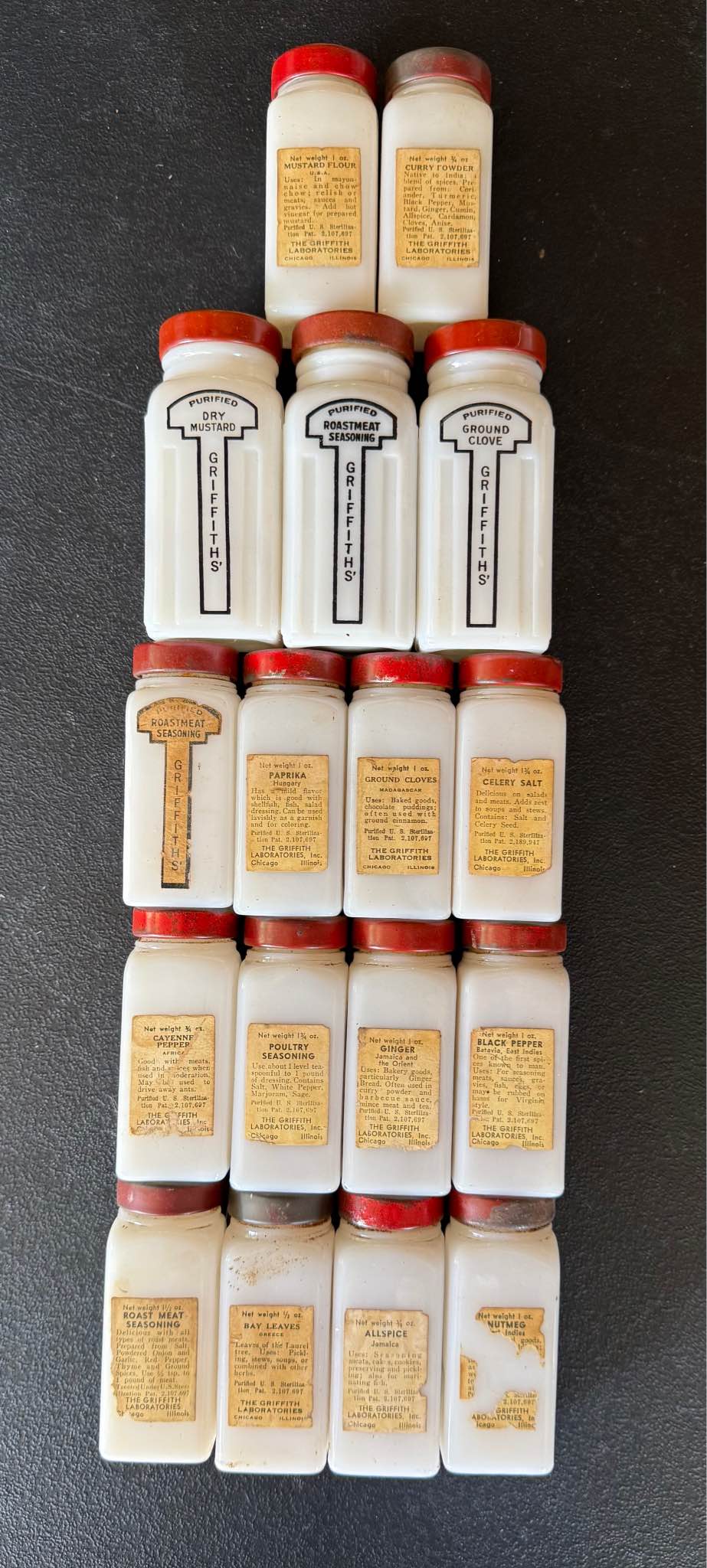 Collectible set of 18 vintage Griffith's spice jars. Jars are