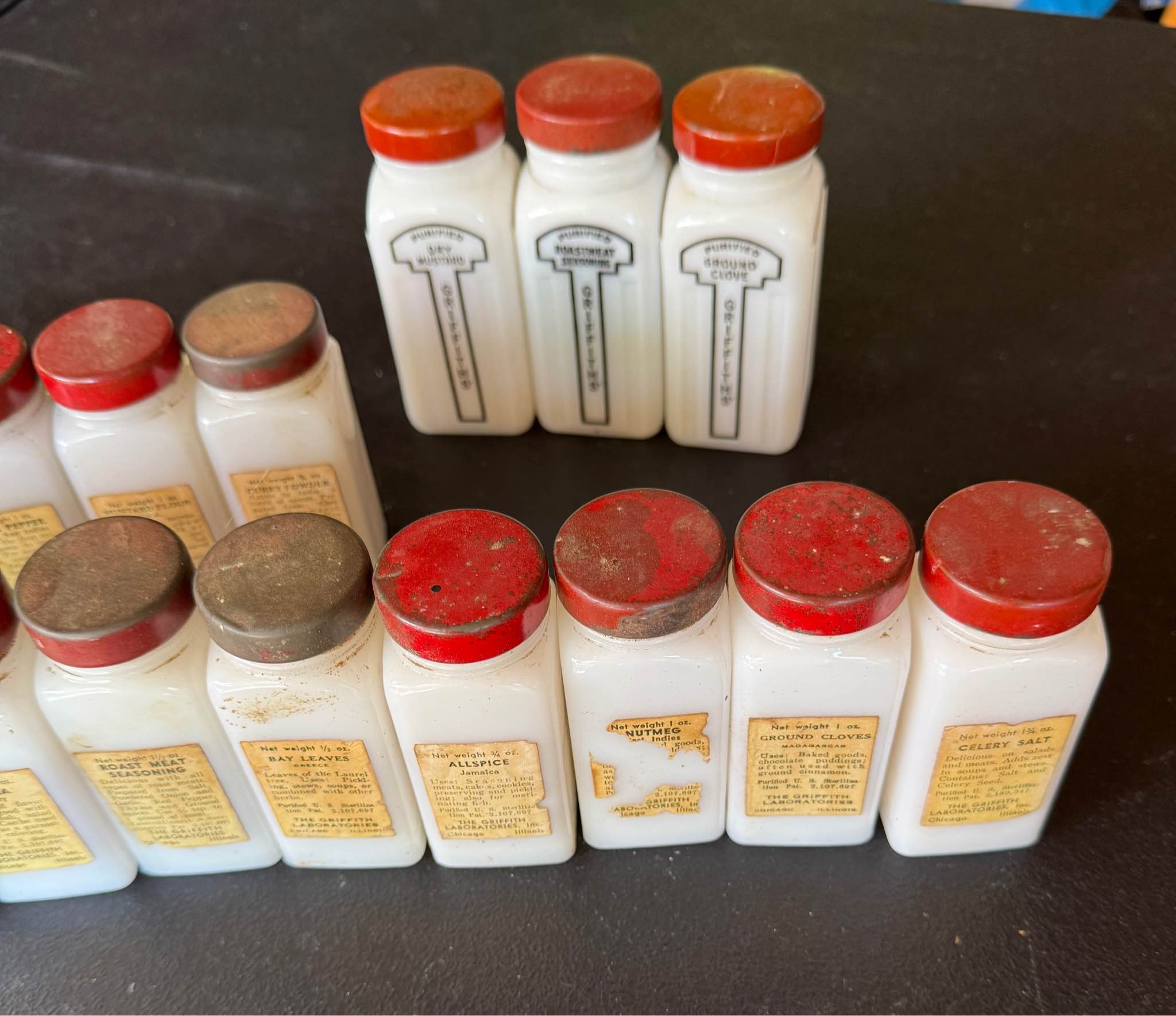 Collectible set of 18 vintage Griffith's spice jars. Jars are