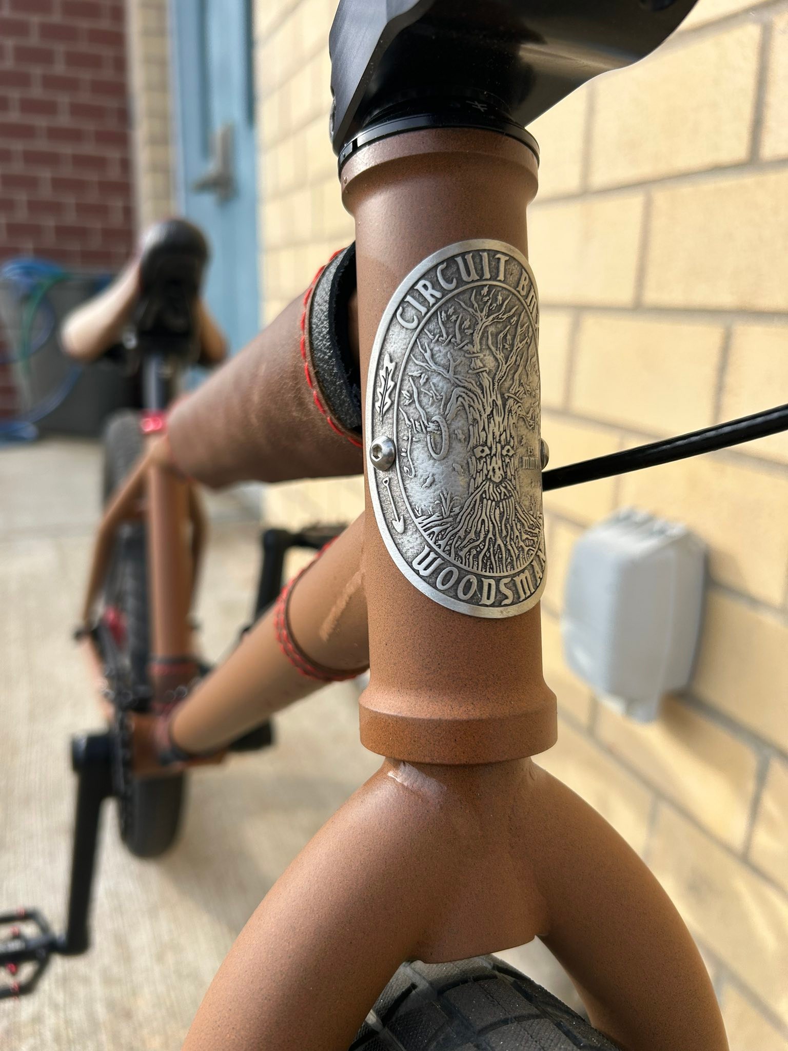 Custom bike seat and leather pads for circuit woodsman