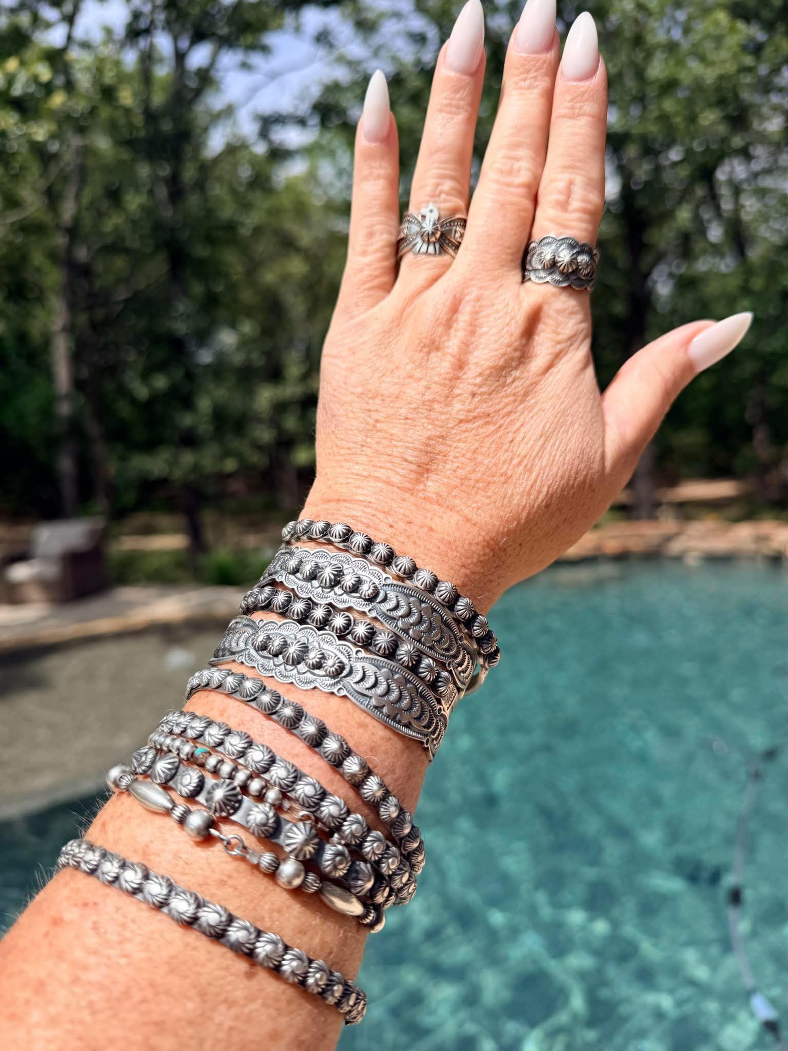 Traditional Navajo silver and stone art by Bo Reeves.