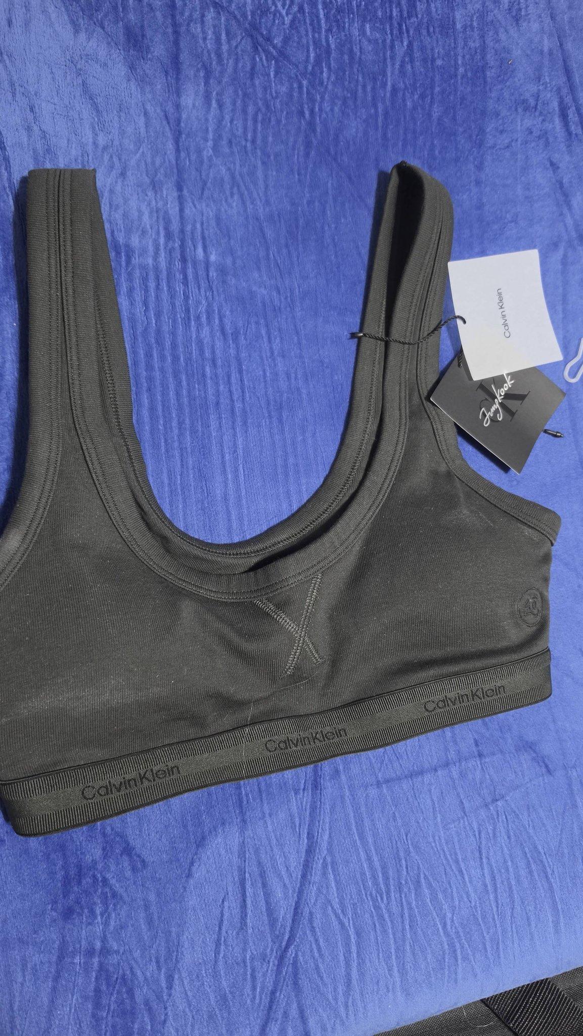 Jungkook Calvin Klein bralette and logo tee for sale