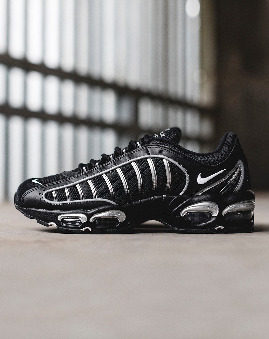 The Nike Air Max Tailwind 4 sees itself cladded in a black wolf