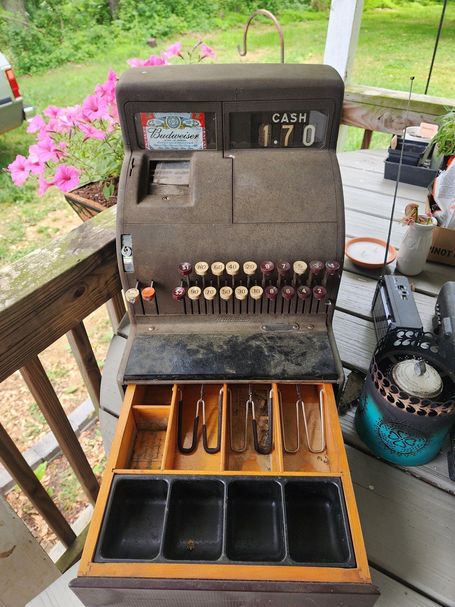 What is the year and value of my antique national cash register?