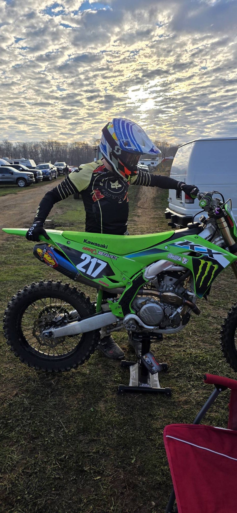 マエさん Stolen green Kawasaki KX250 dirt bike with number 217 in New