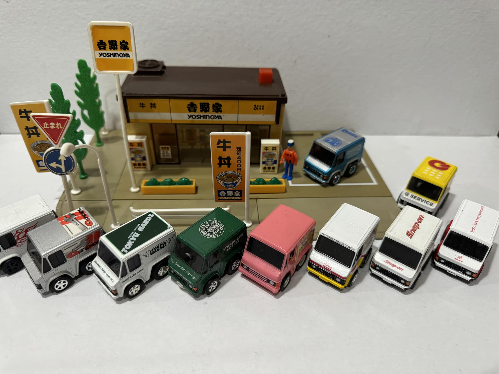 Toyota Quick Delivery Trucks on a Yoshinoya Tomica Town Playset Gen 1