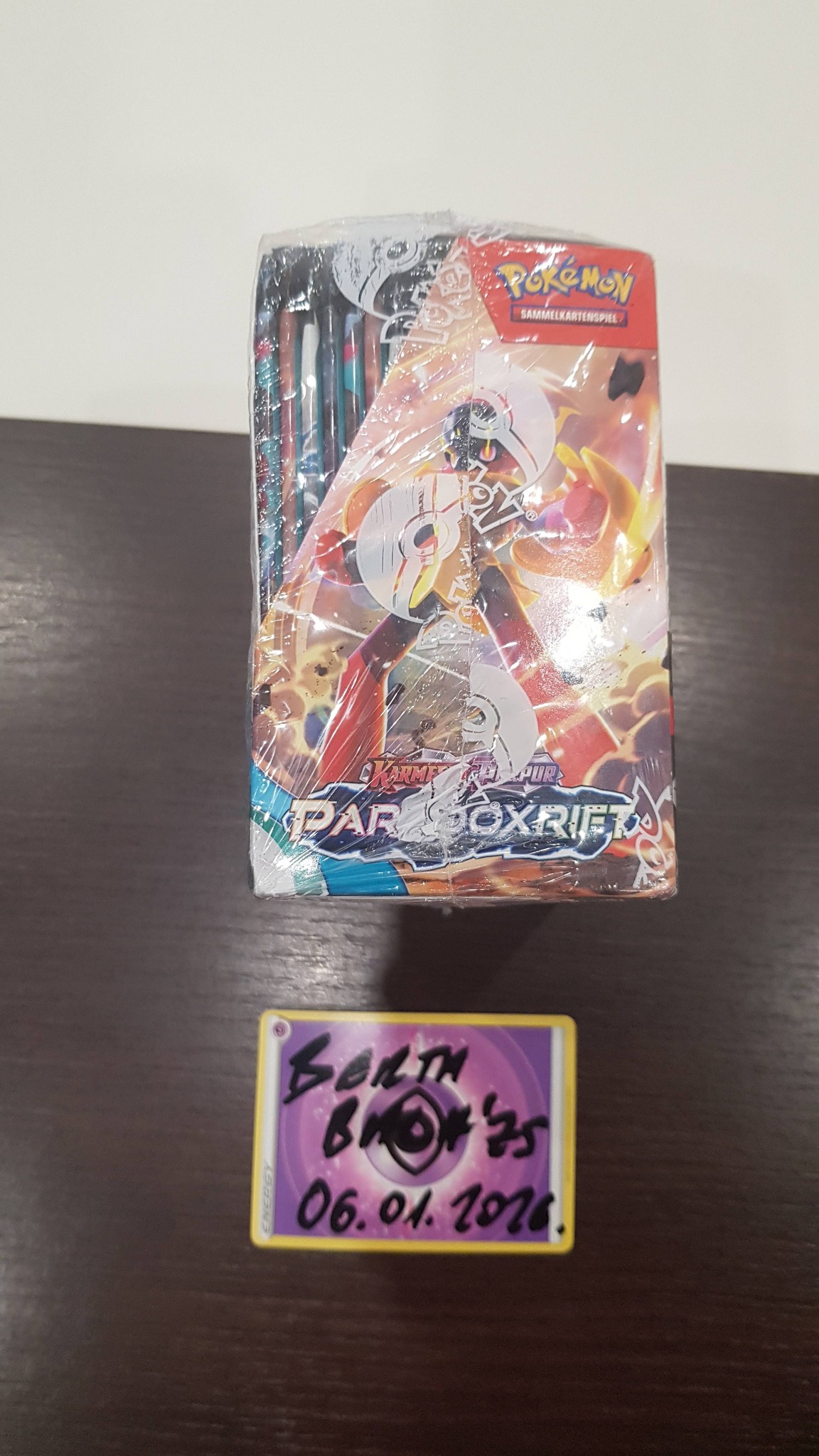 paradox rift booster box value featuring stunning cover art showcasing either the Roaring Moon or the Iron Valiant Pokmon TCG: Scarlet & Violet-Paradox