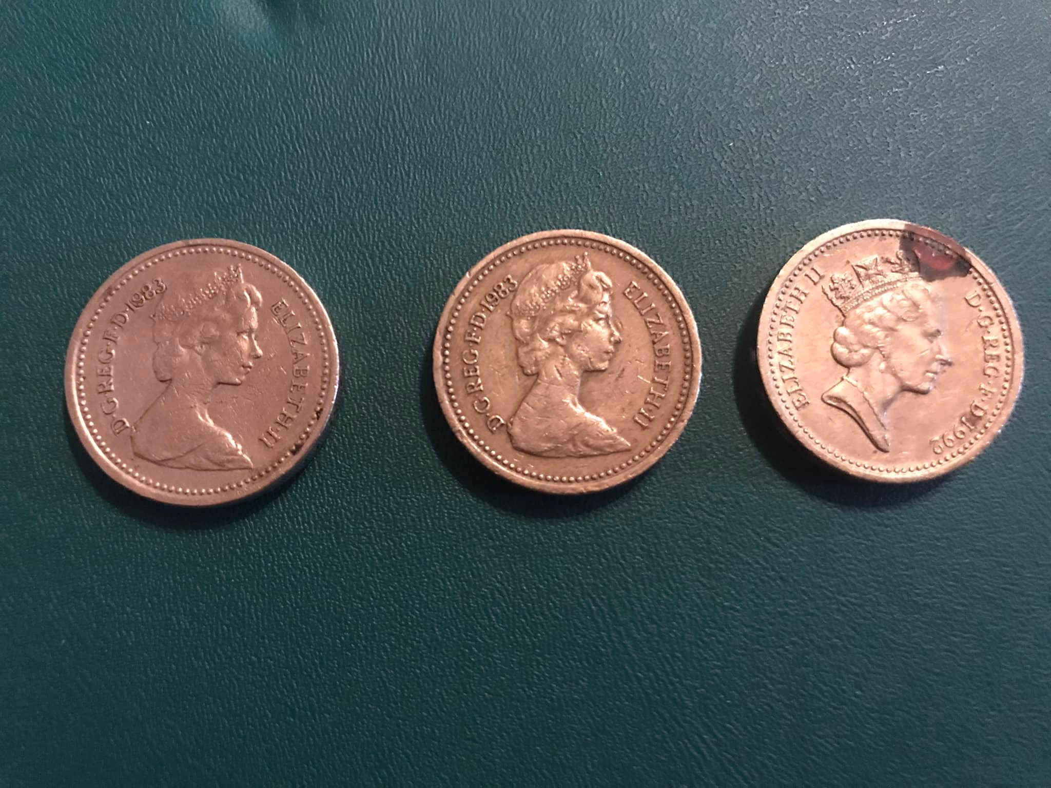 Are 1983, 84, 92 D.G. Red F.D. Elizabeth II coins with upside-down