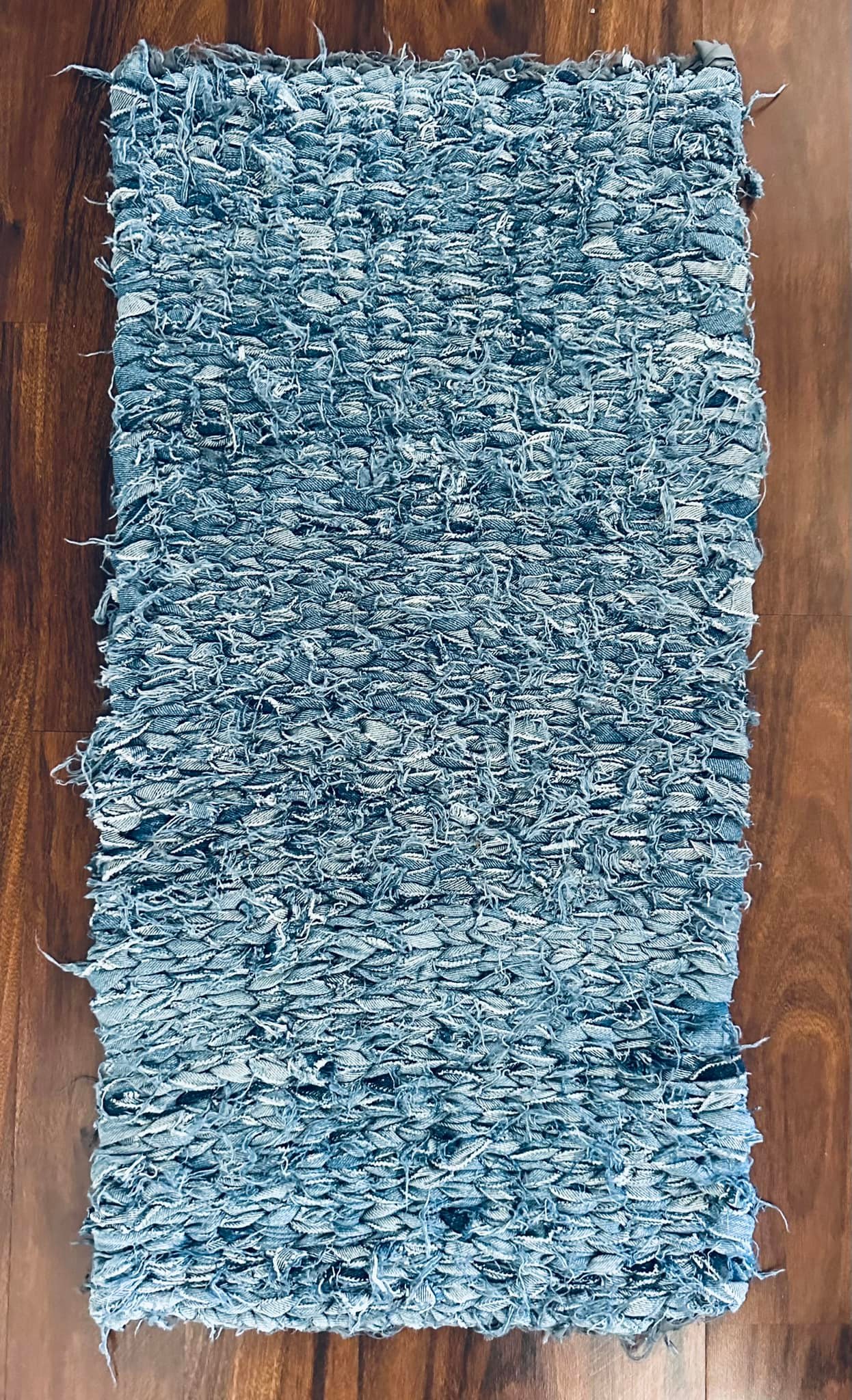 Upcycled rag rug making with shredded bed sheets
