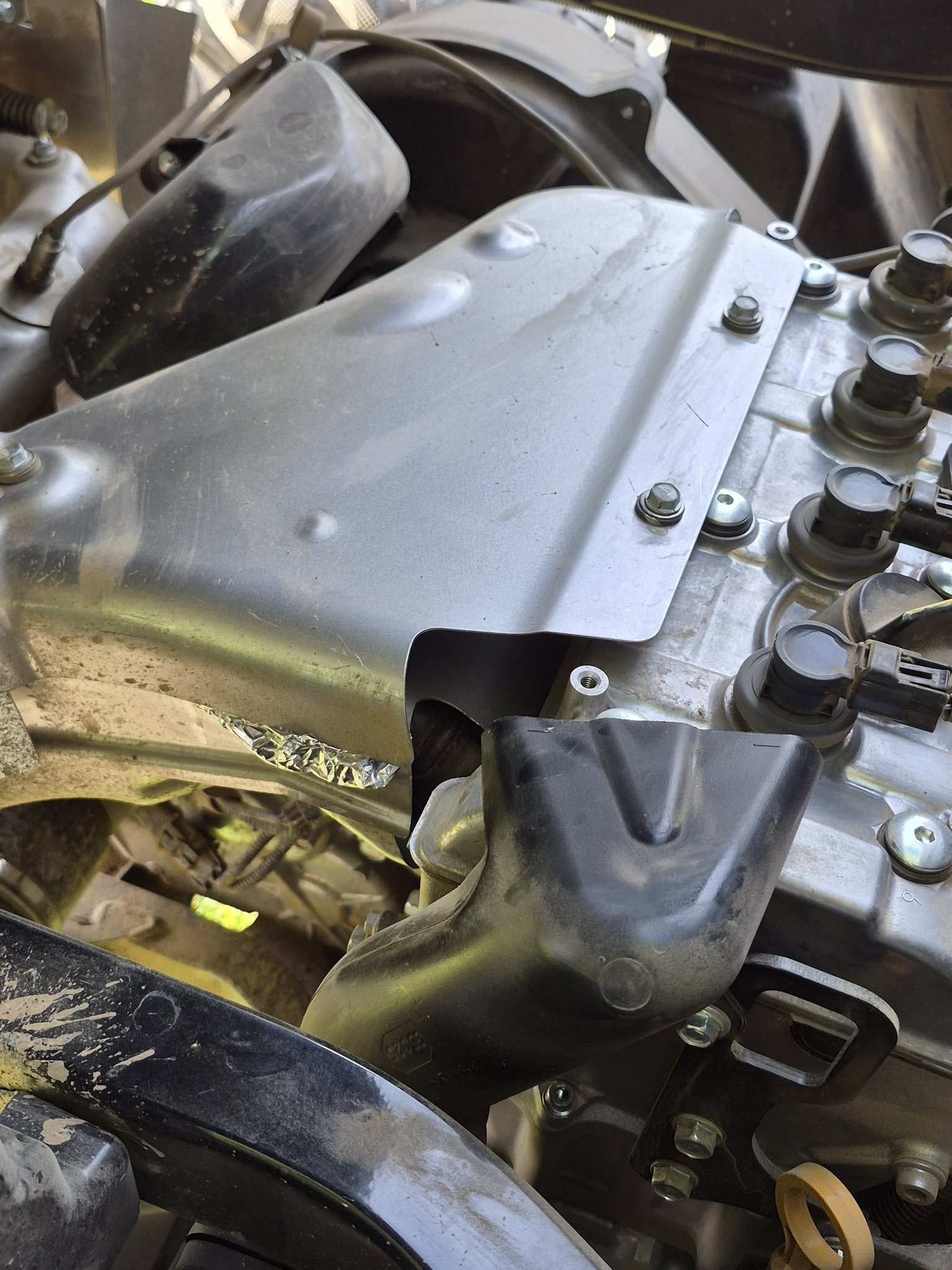 Kawasaki Ridge heatshield vibration fix with tinfoil