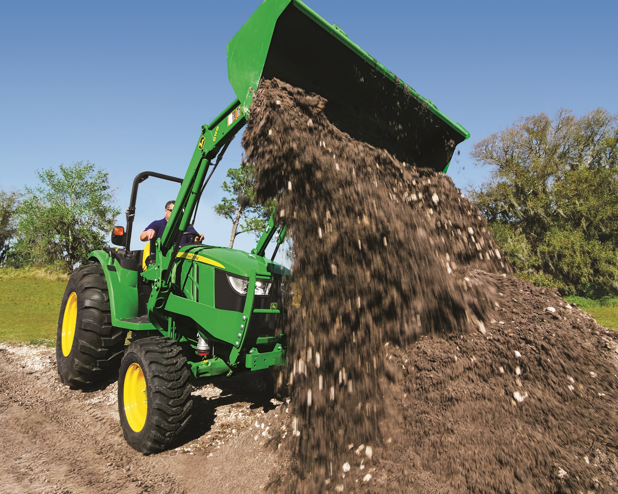 The 4052M with a D170 loader... - U S Tractor & Harvest, Inc.