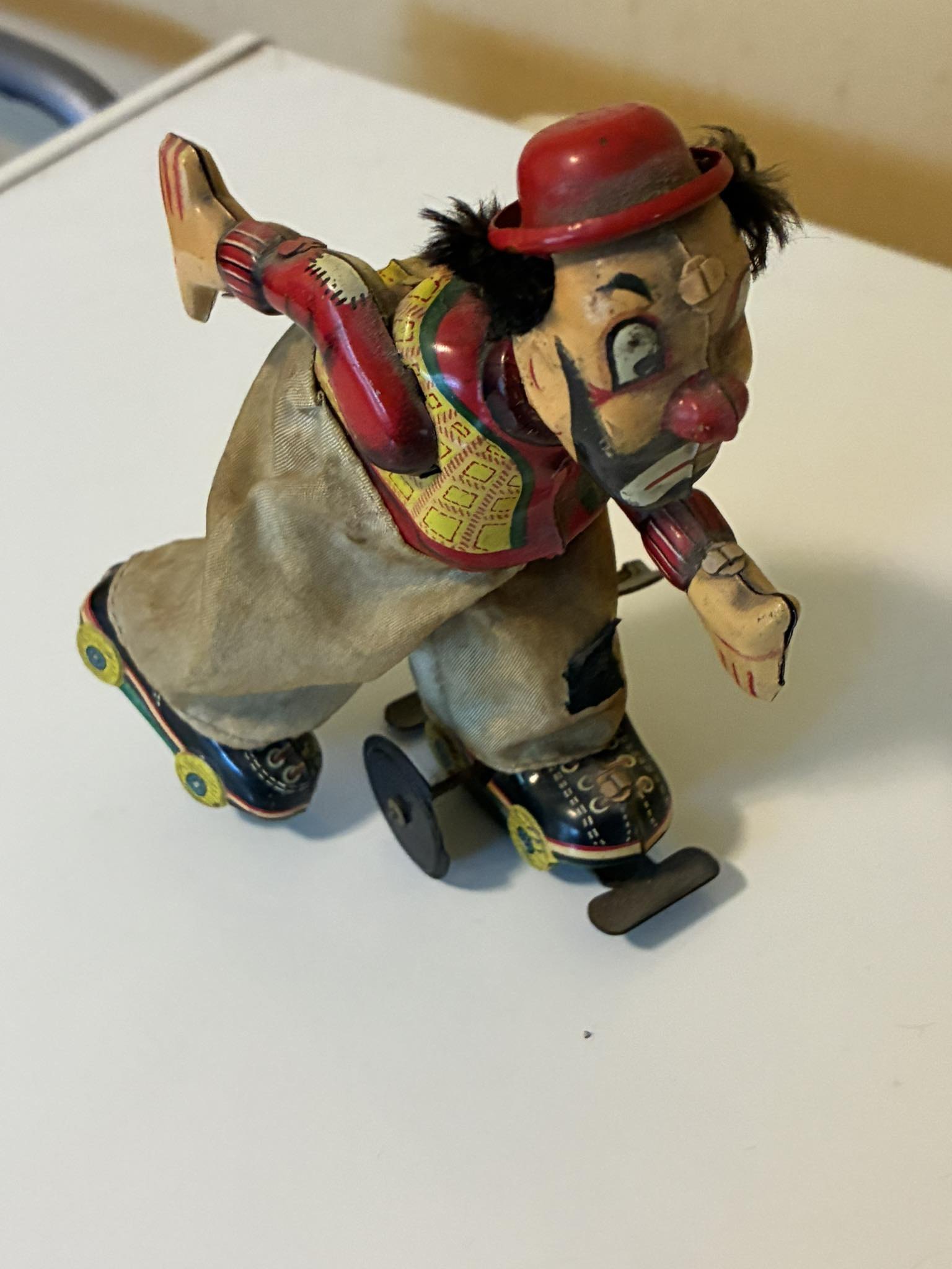 Vintage clown on roller skate toy for sale