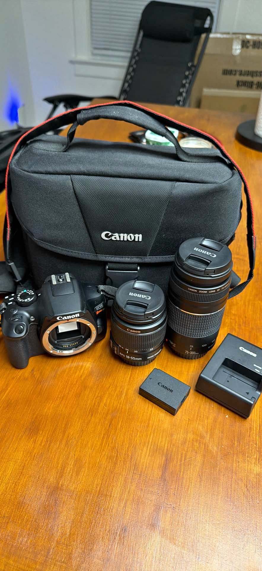 Canon camera, with 3 lenses, (18-55, 75-300, and 100-400) bags, and ...