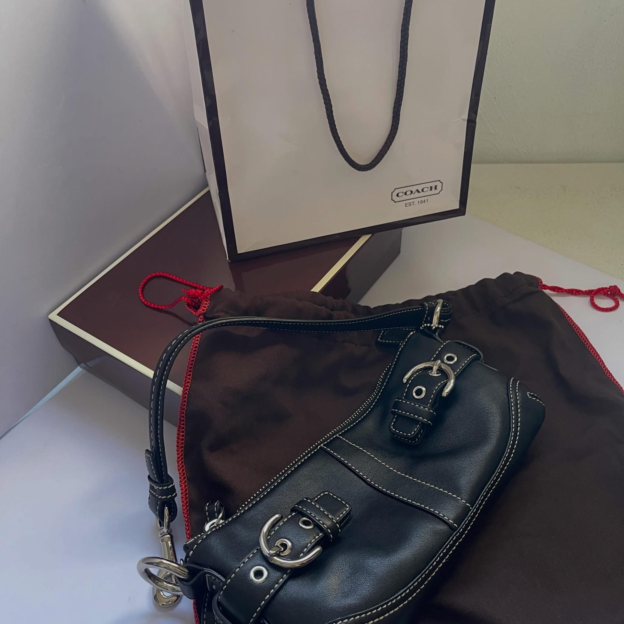 vintage black leather Coach Soho small baguette shoulder bag from 