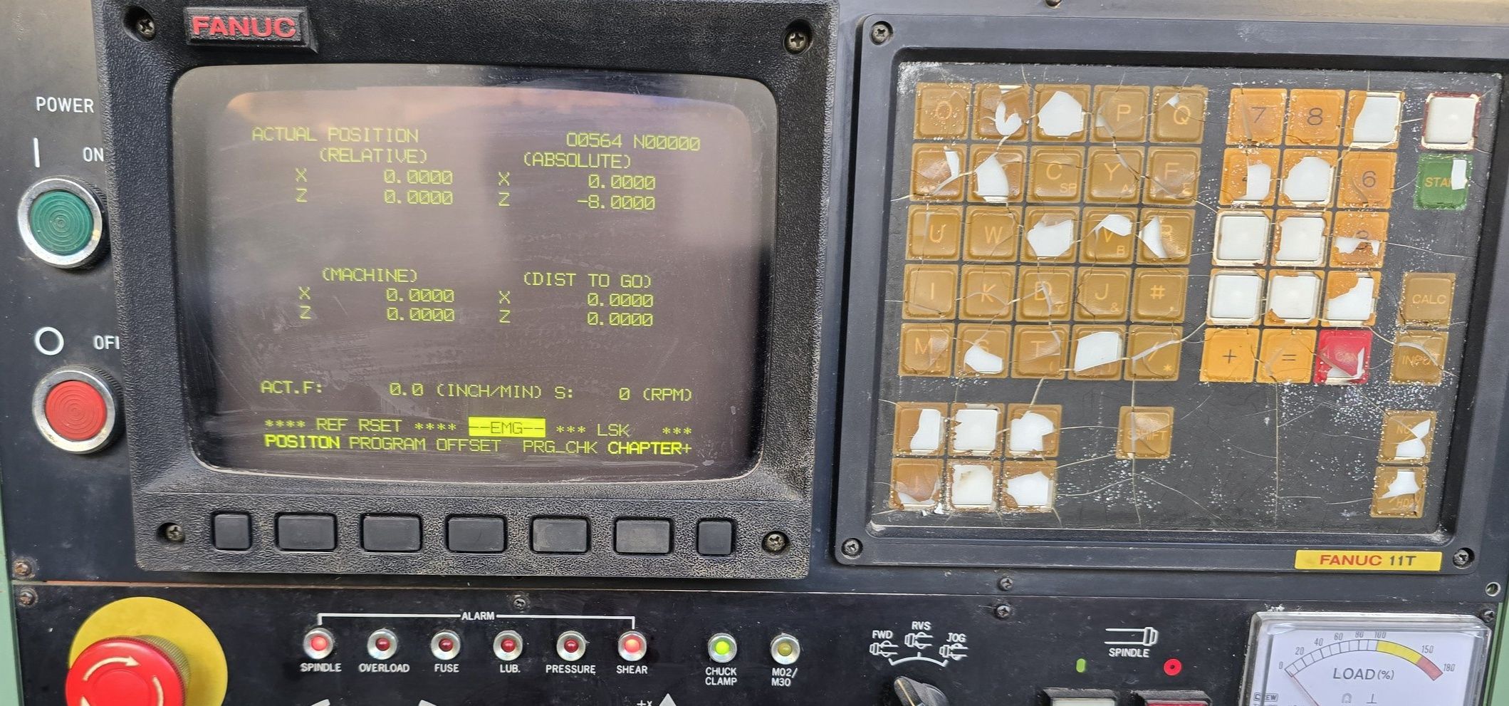 Why is Daewoo Puma 6 HS with Fanuc 11T alarm locking the machine