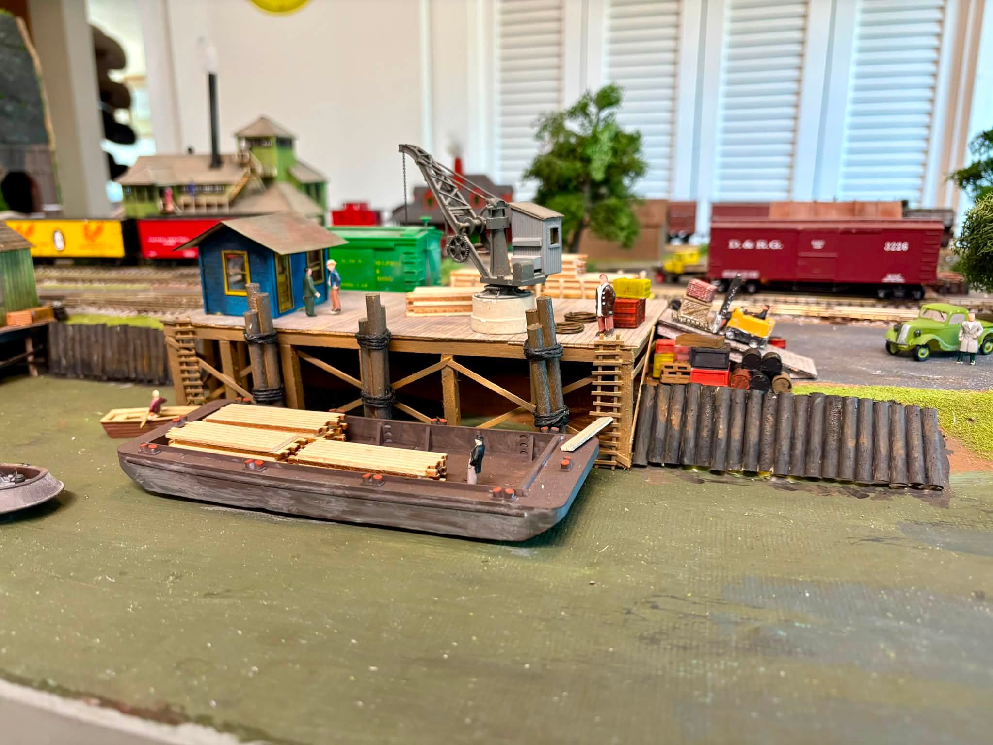 HO scale model train wharf nears completion