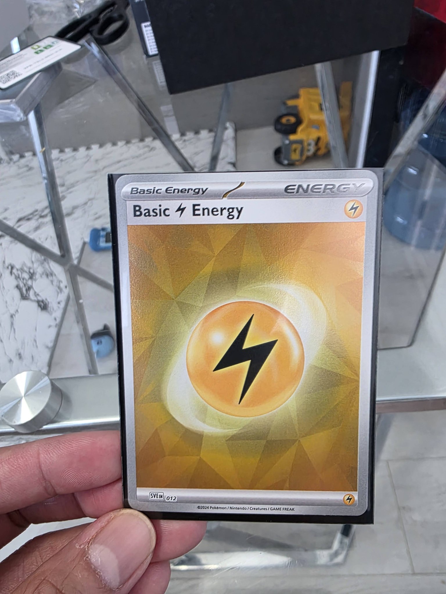 Why is the PSA 10 price for Basic Lightning Energy so high at CAD 800?
