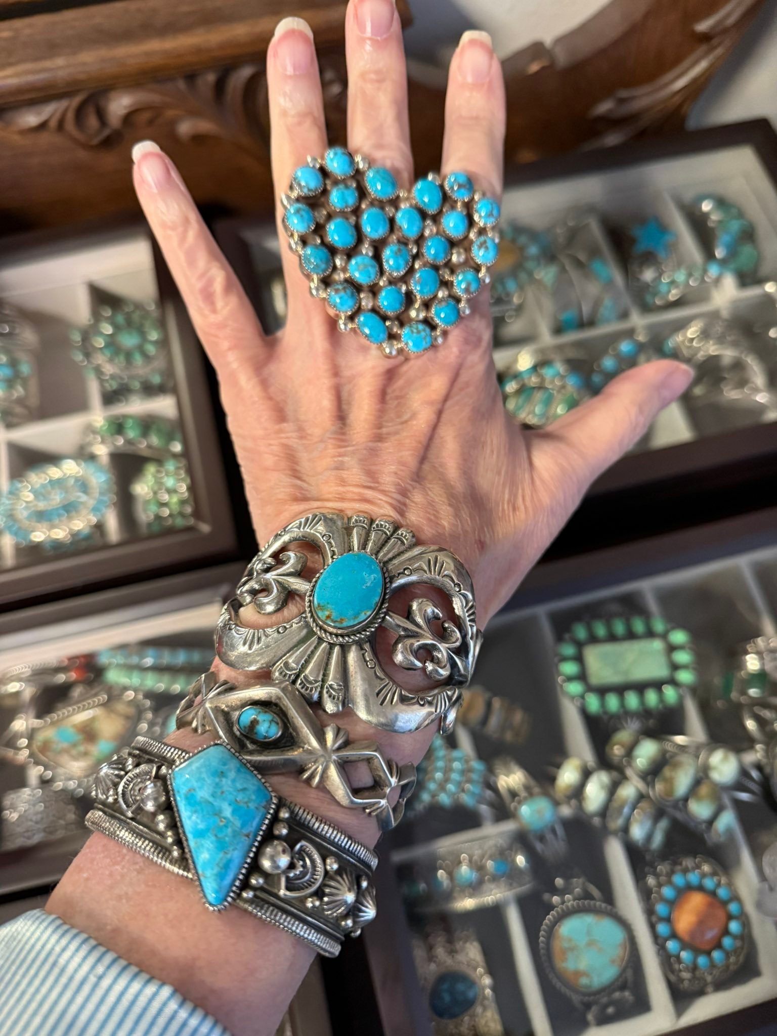 Navajo art pieces and turquoise jewelry highlights