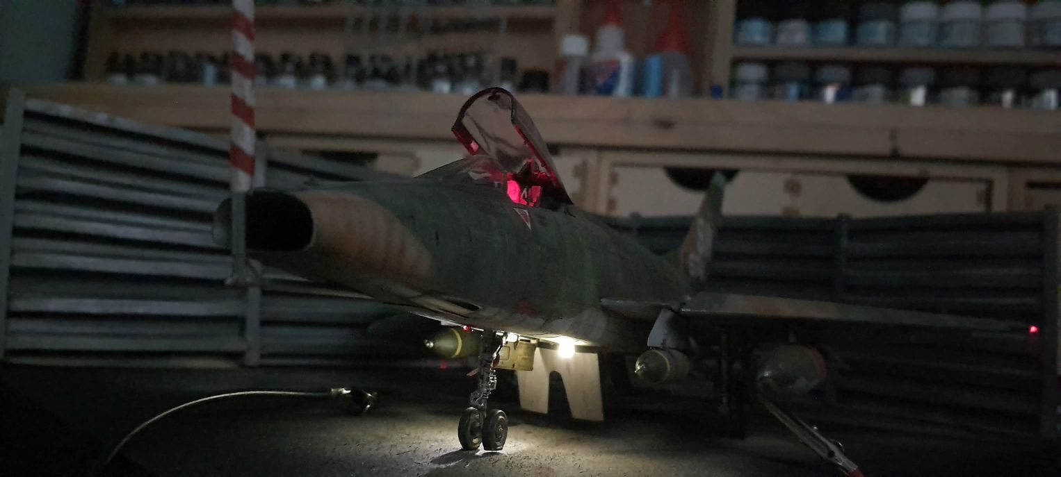 Here is a photo of a South East Asian (SEA) camouflage F-100 Hun
