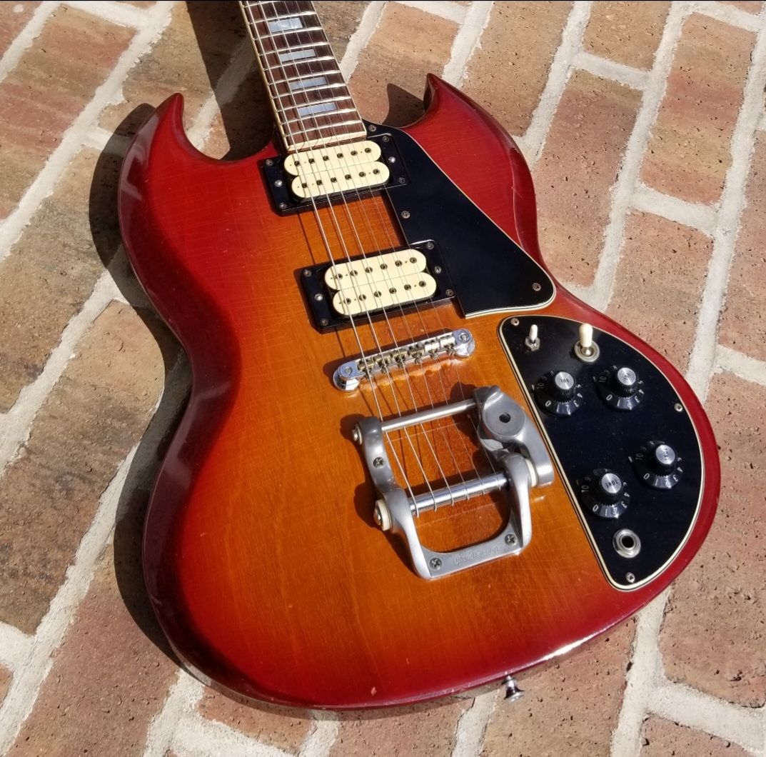 1973 Gibson SG's original cherry finish revealed