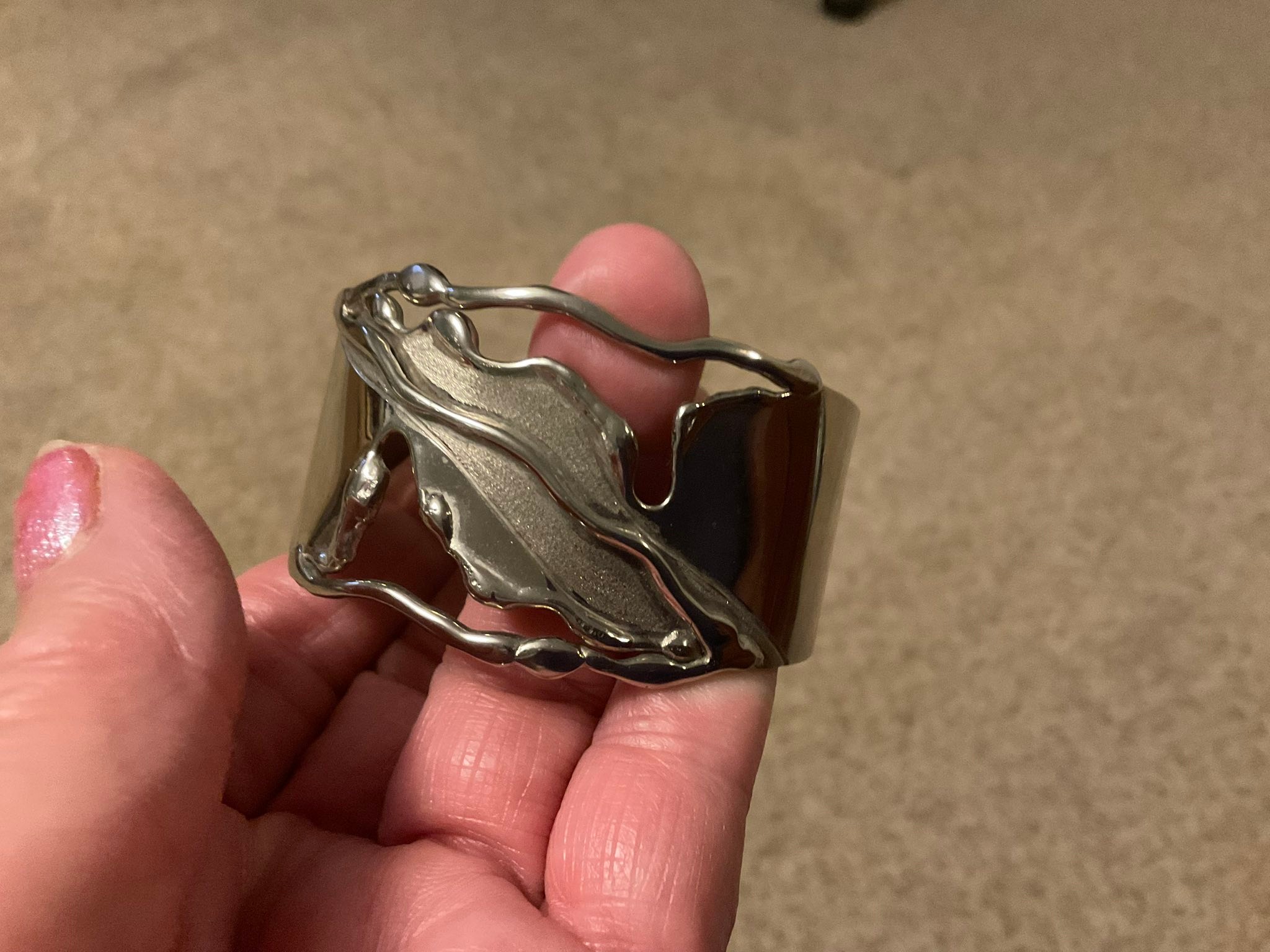 Just purchased this cuff. It is 14K and Sterling, Signed G. Reeves