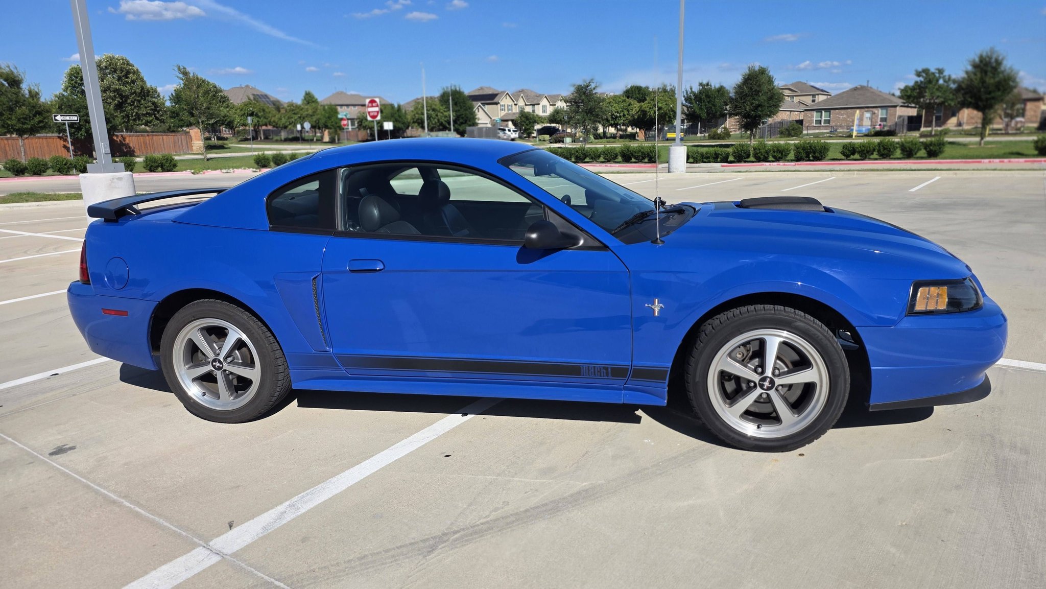 Updating pics and info 2003 Mach 1 Azure Blue 5spd with IUP with