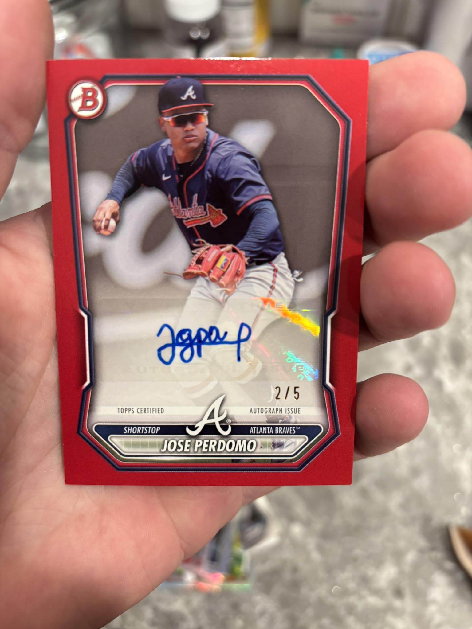 What is the value of a Jose Perdomo autographed baseball card?