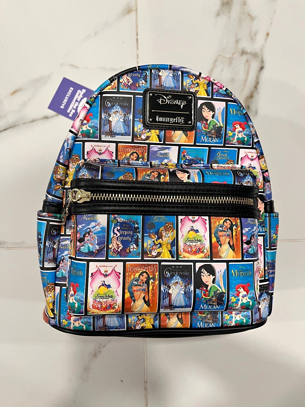 disney princess vhs tapes loungefly mini backpack and The Frog 15th Anniversary : Clothing, Shoes & Jewelry At the base of the pile is Disneys first animated feature and the tale of the very first Disney Princess LOUNGEFLY EXCLUSIVE Disney Princess VHS