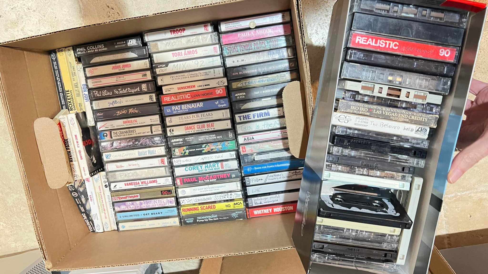 Magnetic tape storage for CDs in steel box