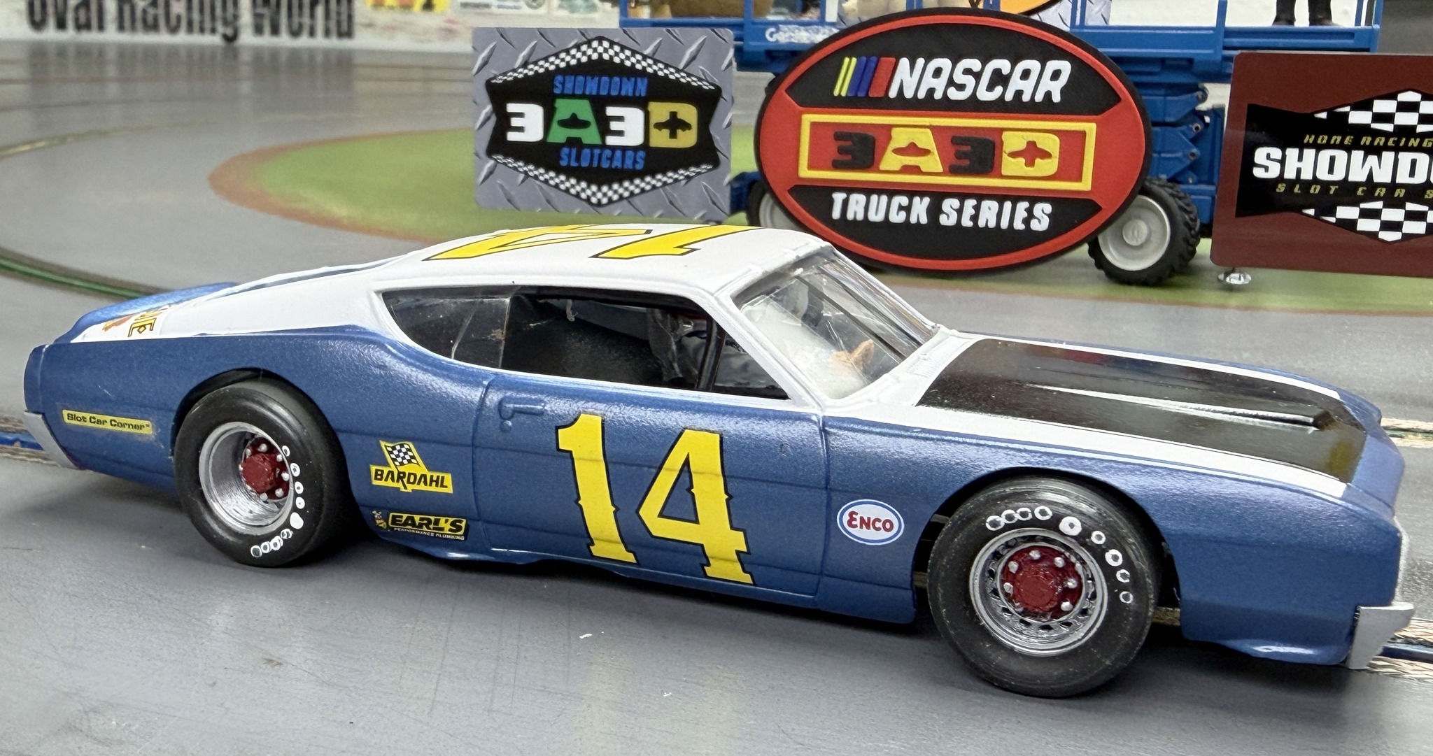Junior's old Carrera car wins with a 2.438 time