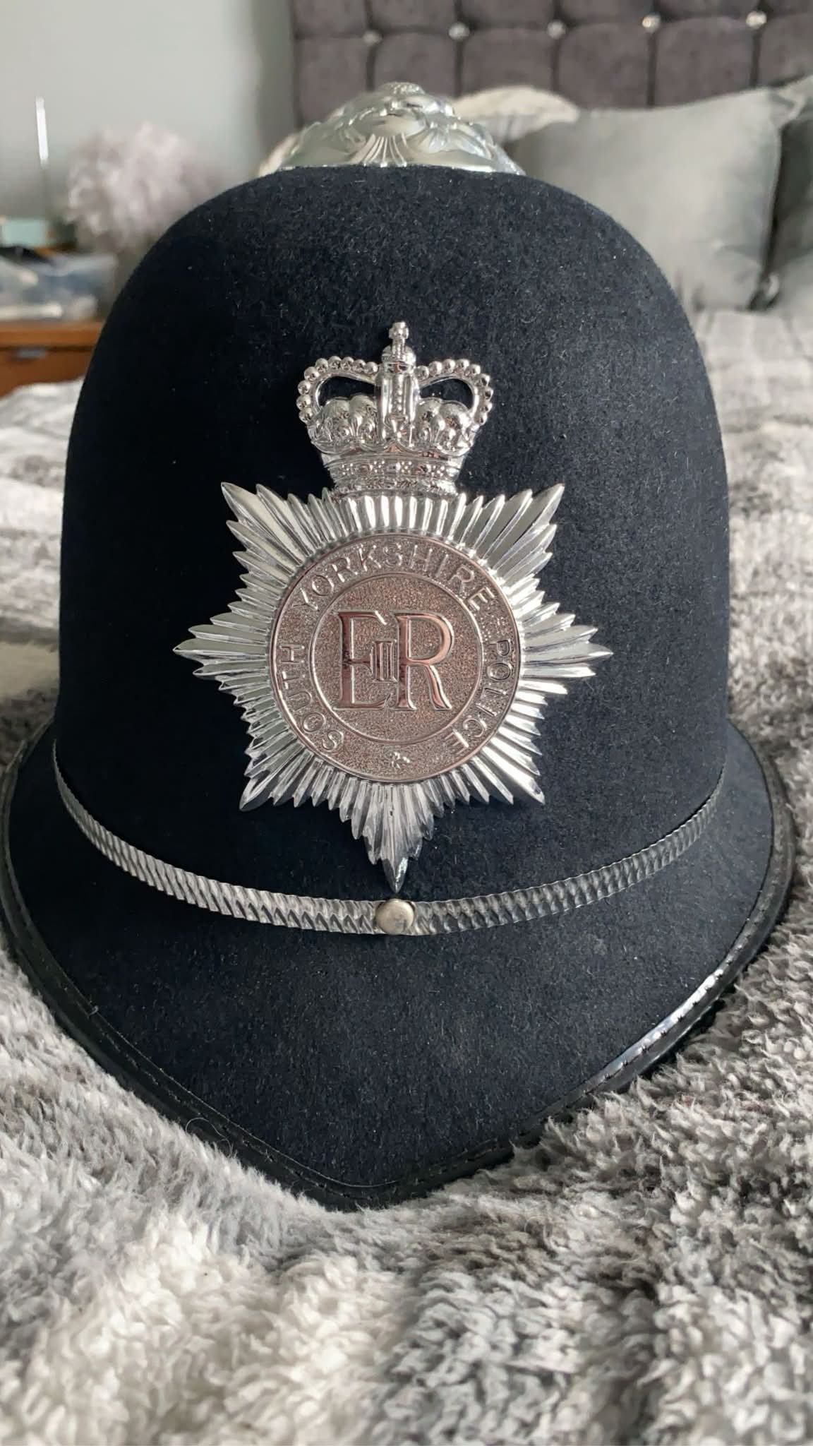 Vintage Yorkshire Police helmet with royal crown badge