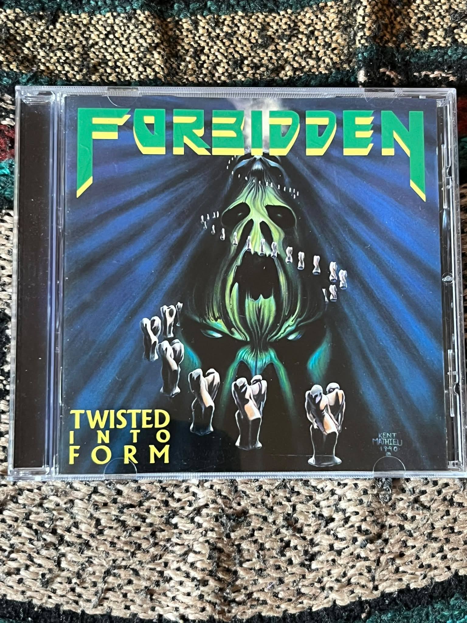 An extremely rare Forbidden poster from 1990 with the Twisted Into