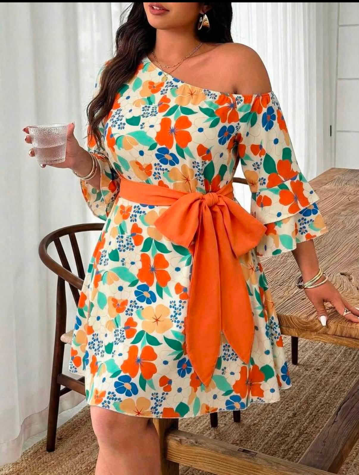 Which of these dresses would be pretty for my 60th birthday party? It will be fiesta colors