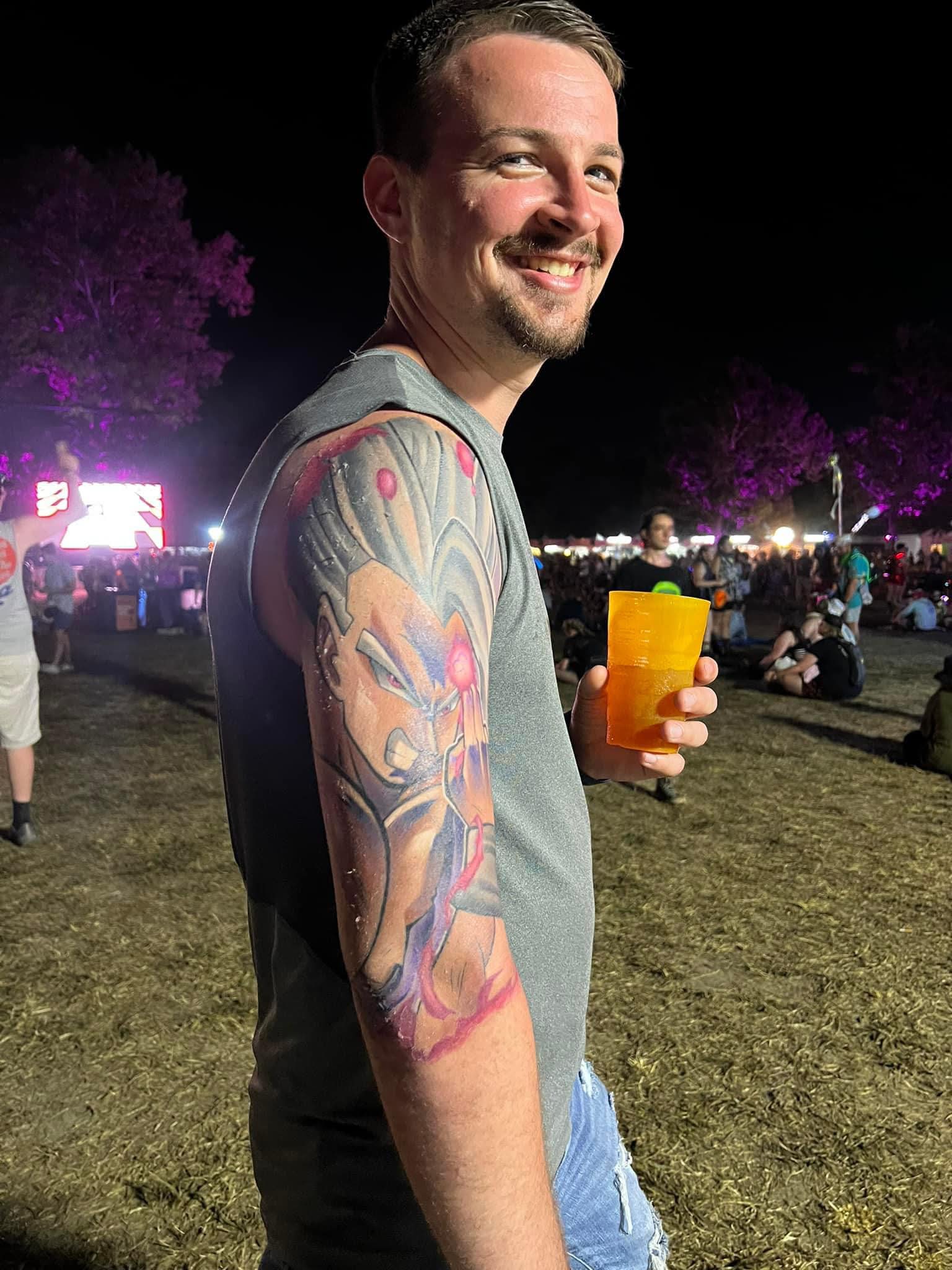 First tattoo! Based on auctioned off toy packaging art by John