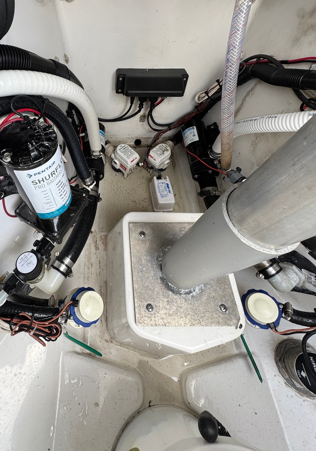 center console macerator fish box Clam 2841 Trap Contains multiple storage compartments and cup holders Durable polyethylene construction Fits most Clam Fish Trap flip 2026 Hurricane Center Console 24