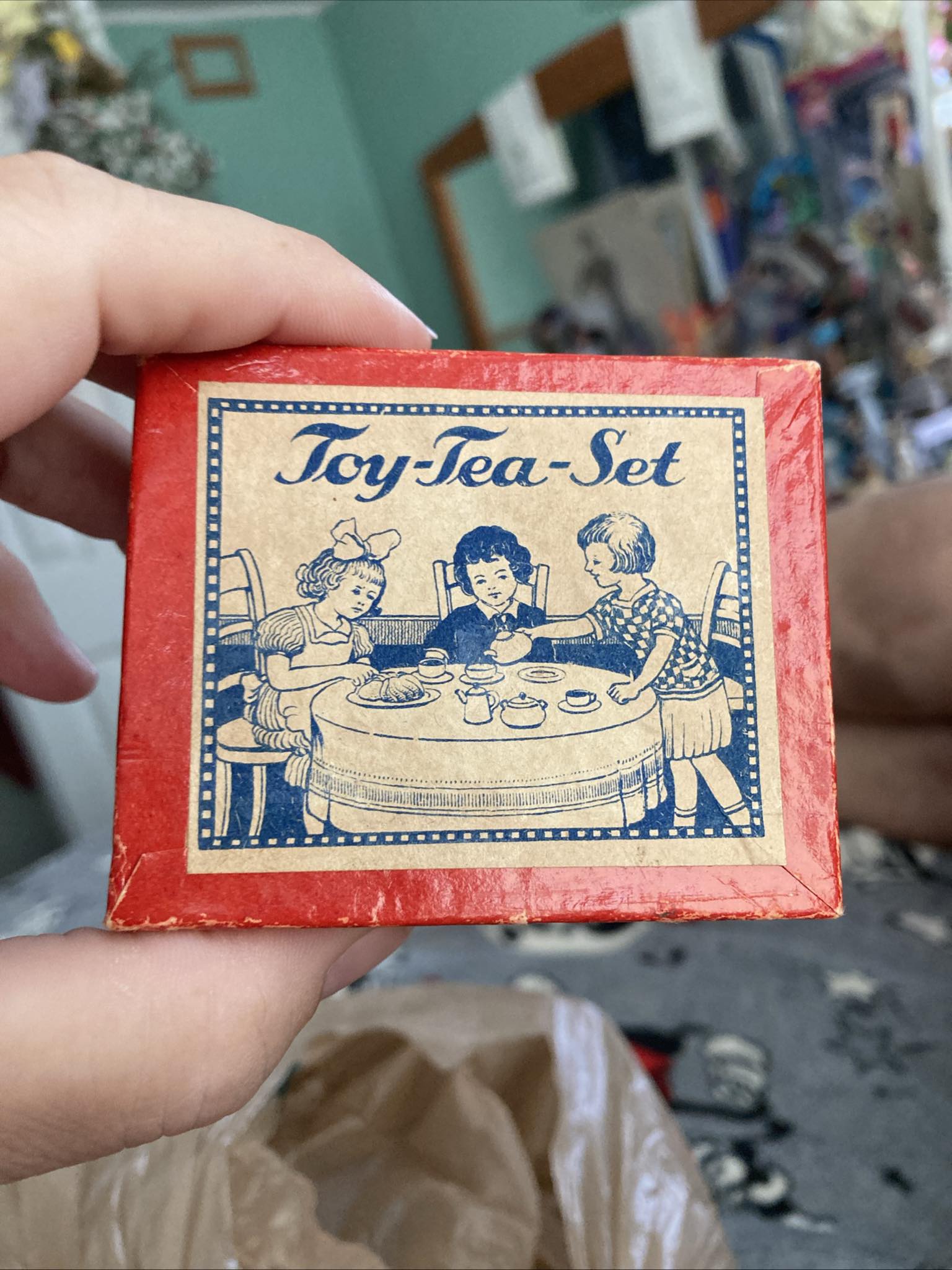 What was in this vintage toy tea set box?