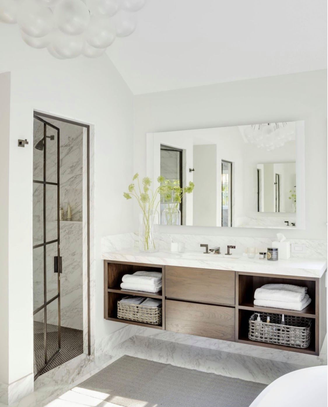 Tile Showcase - This luxury bathroom by Reid Design, Inc....