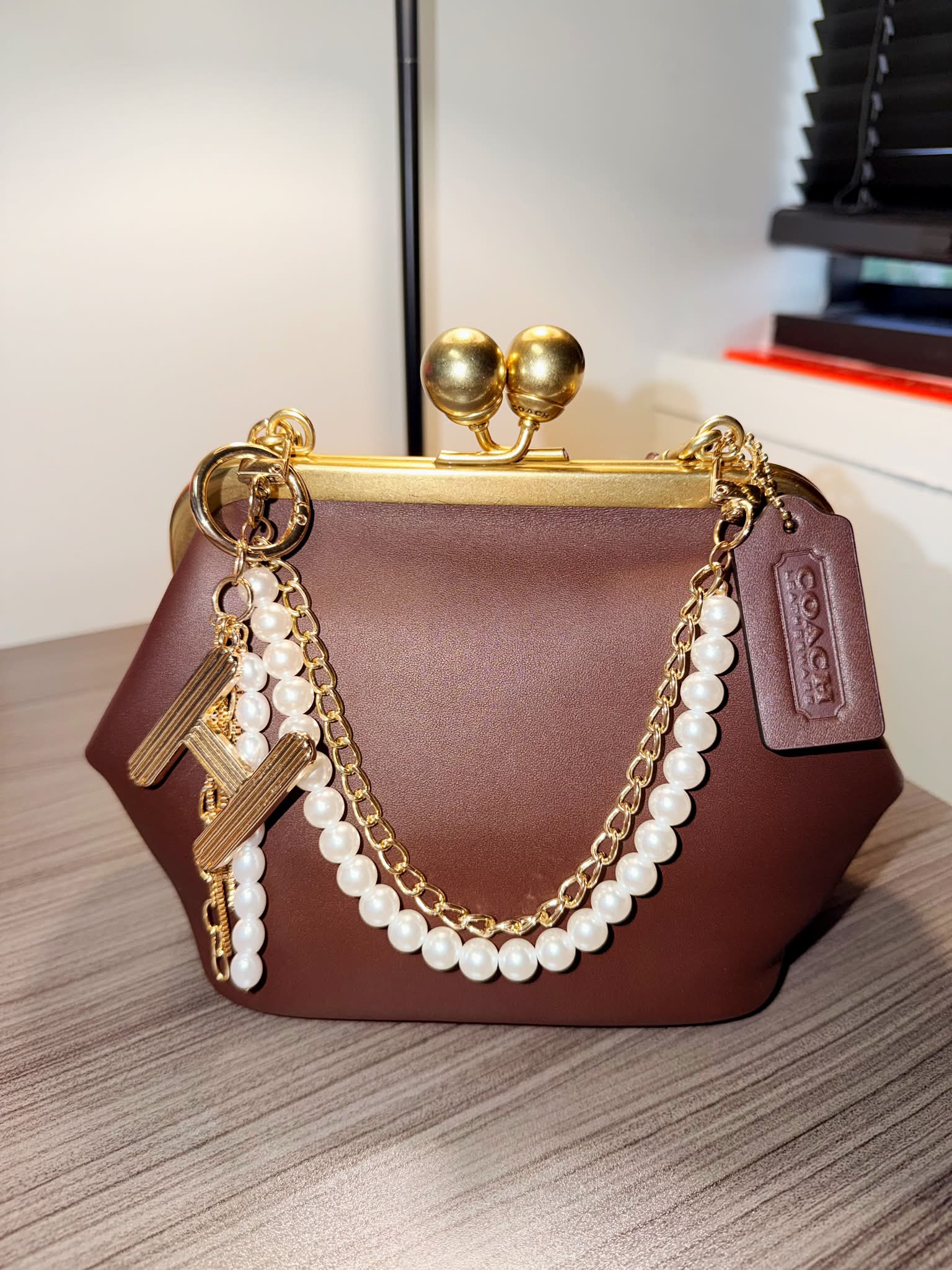 Coach Soho Kisslock bag in chocolate brown
