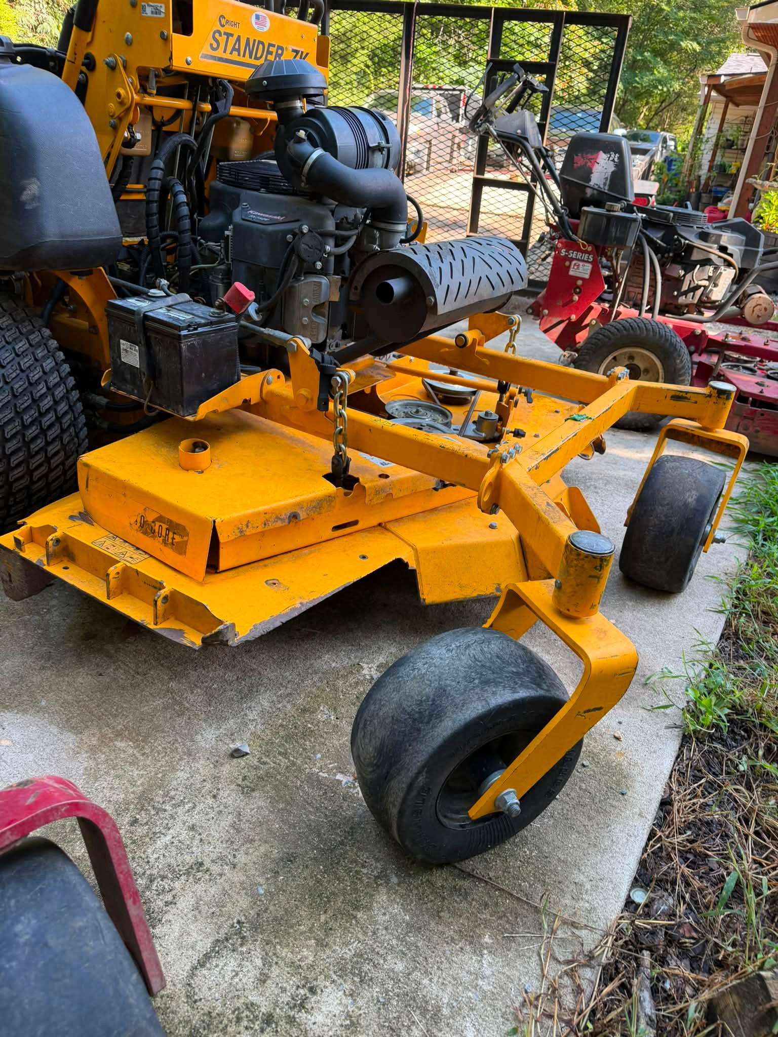 Wright ZK 61 lawn mower for sale with 1500 hours, deck damage, and