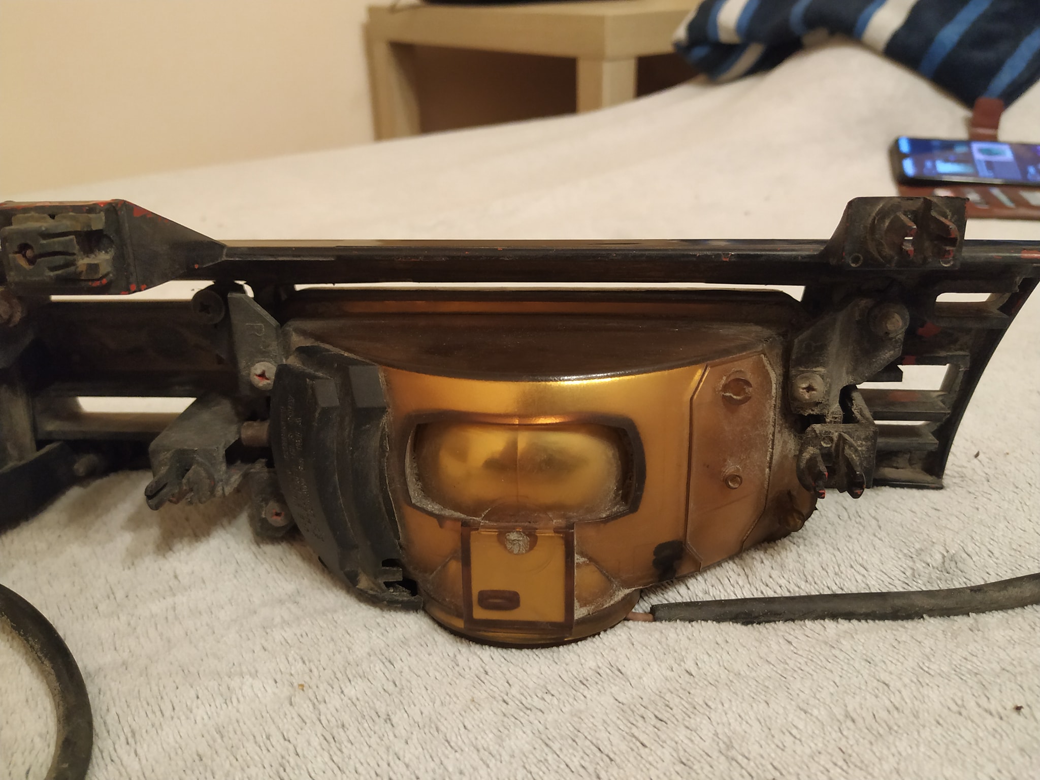 Mazda 626 GD 1987-1991 ZKW front grill with lens lamps.