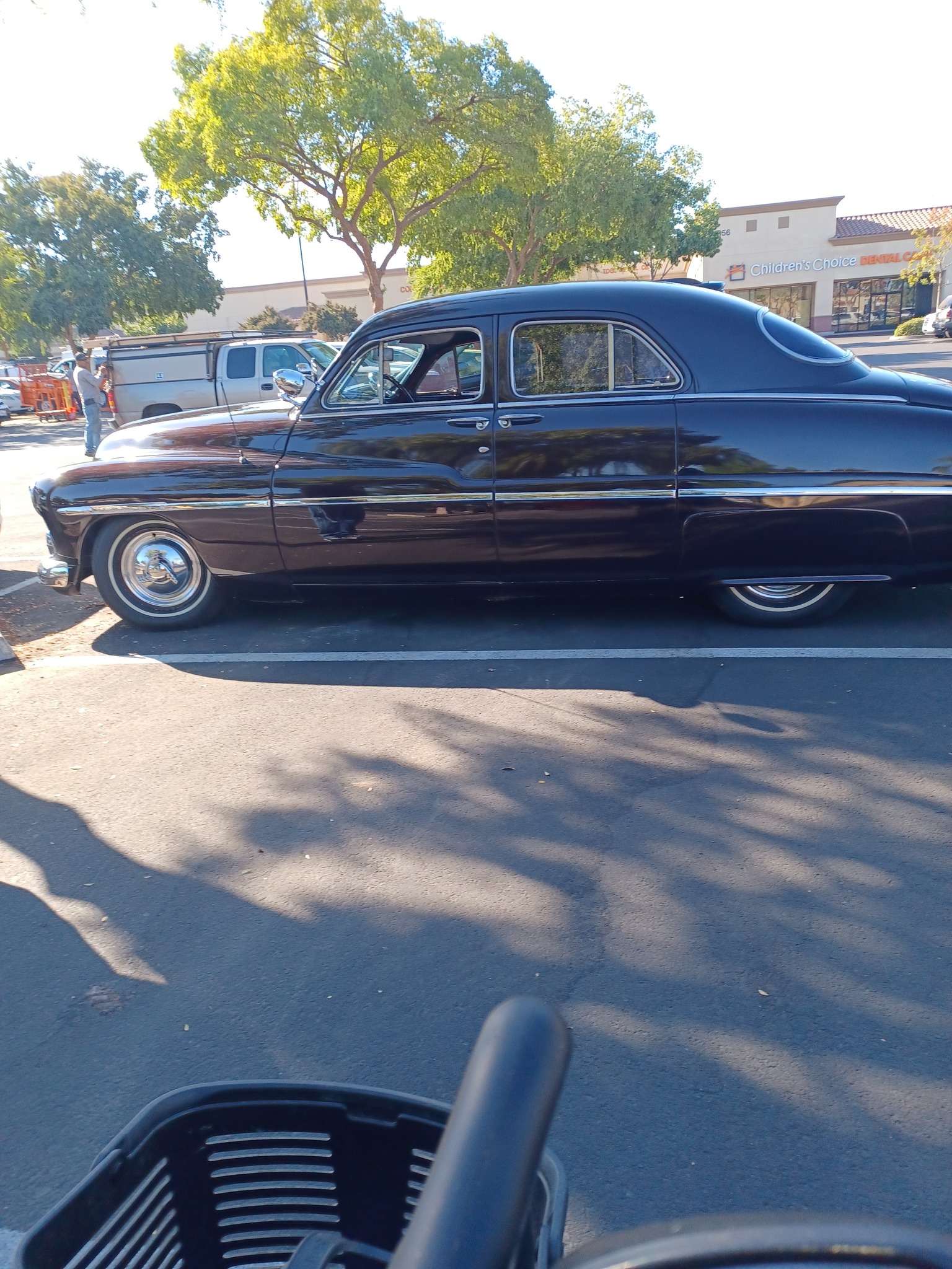 What was the sticker price of a car in 1950?
