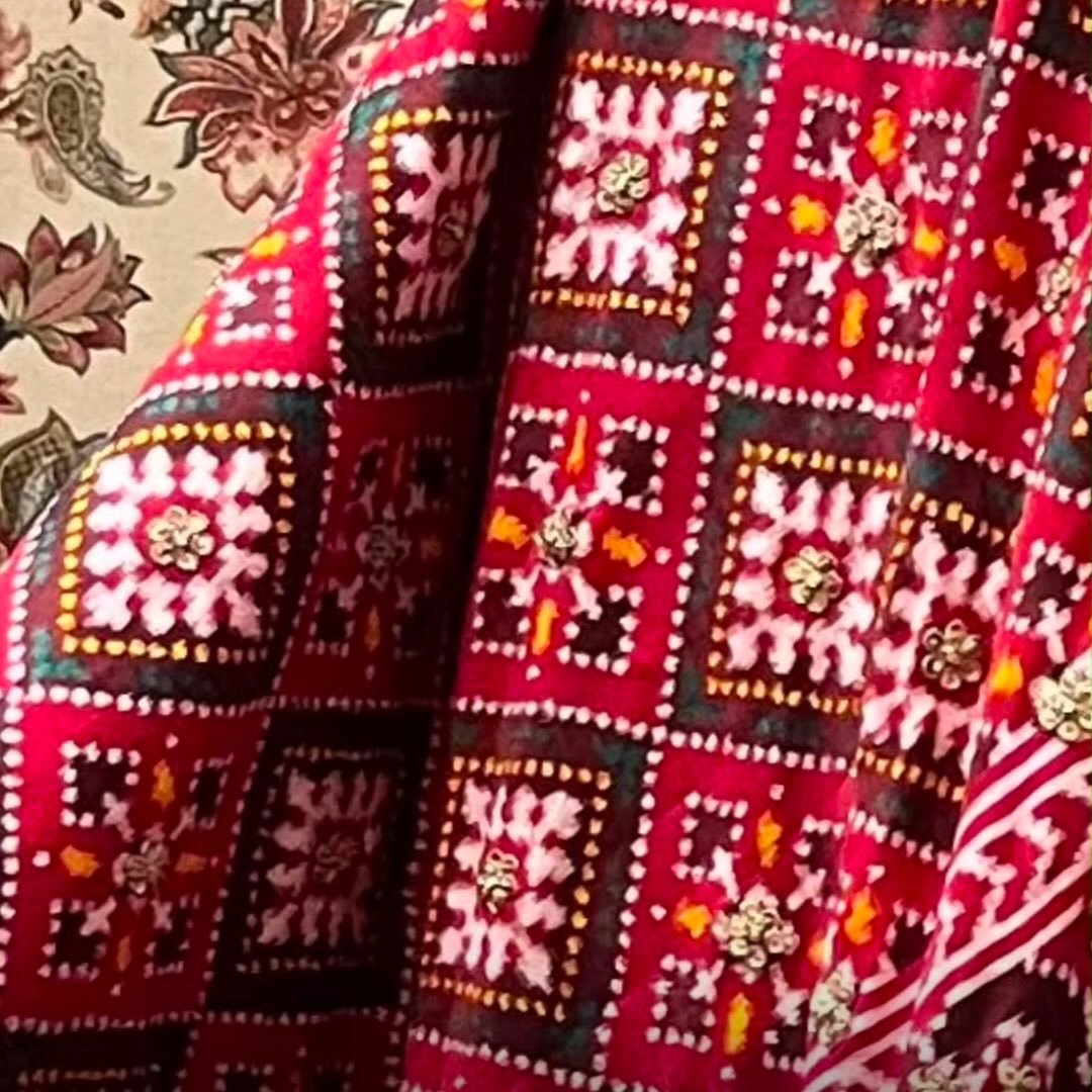 A timeless Patola dupatta with a beautiful traditional design and ...