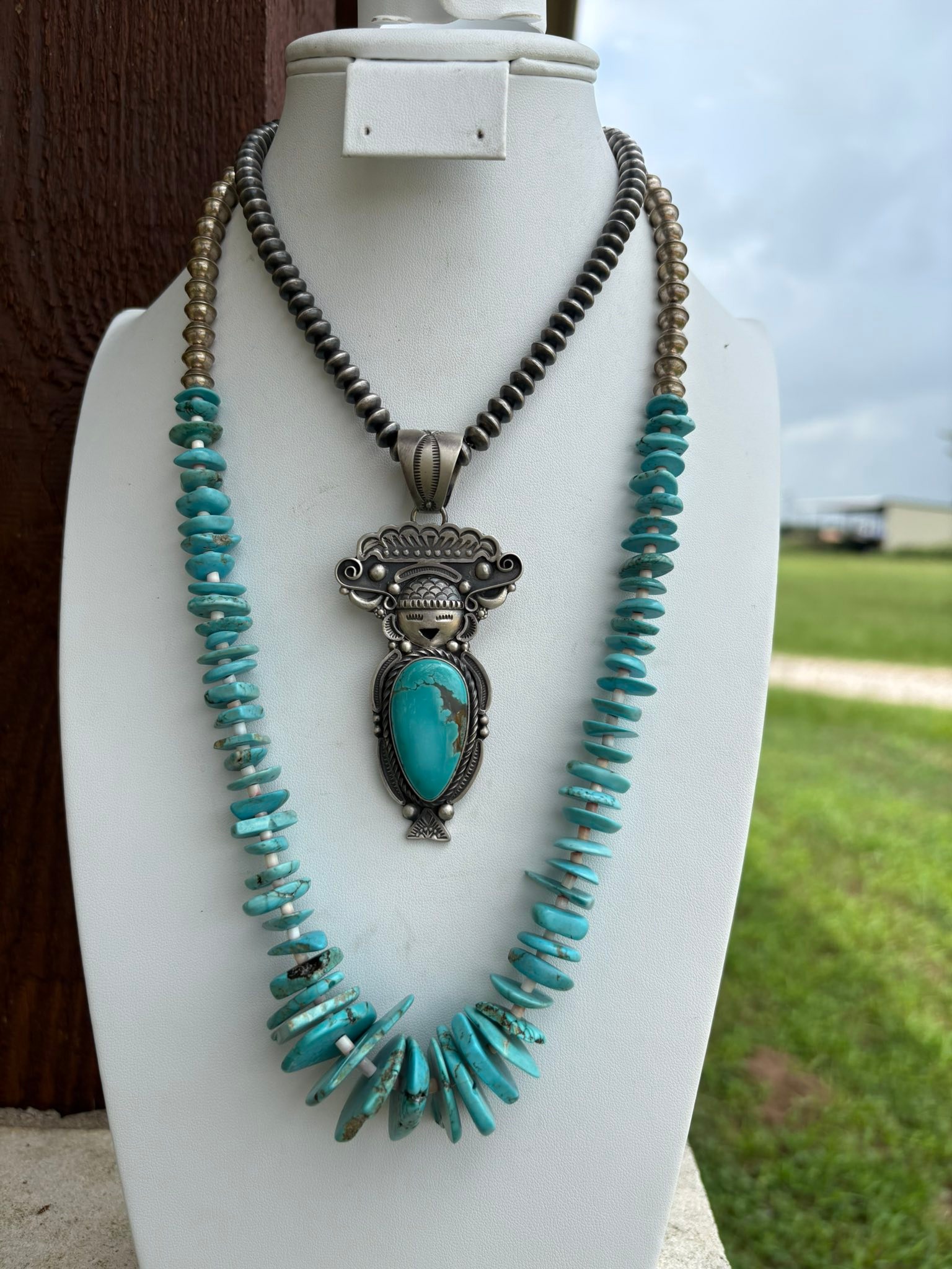 Native American artist Ronald Tom's sterling silver and Pilot