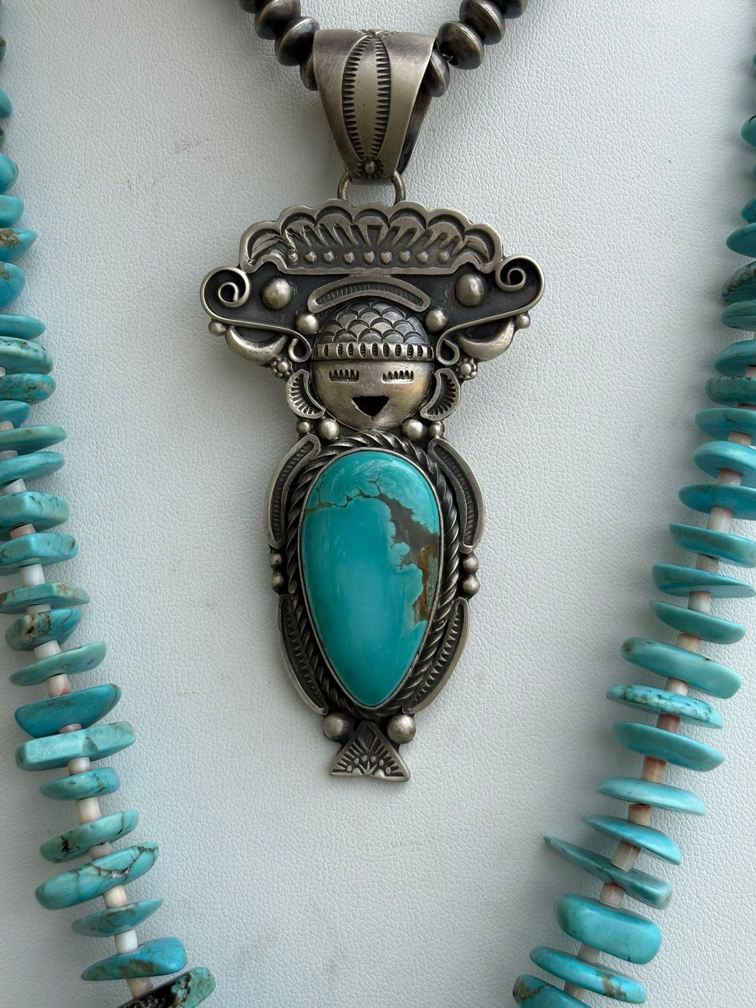 Native American artist Ronald Tom's sterling silver and Pilot