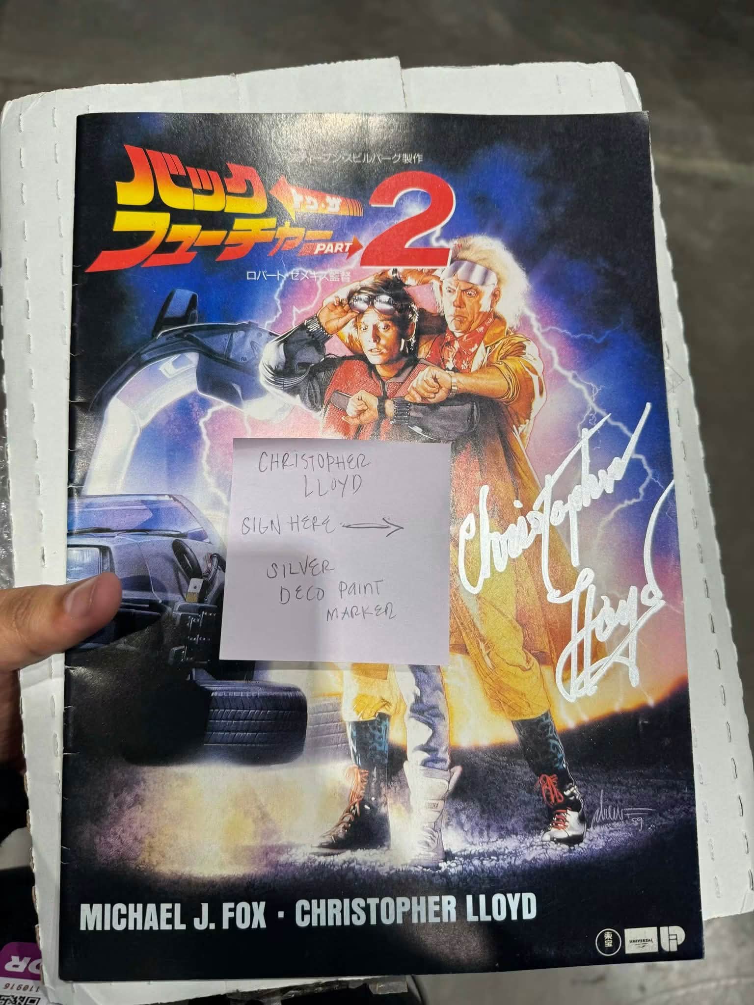 Signed Back to the Future and Nobody posters by Christopher Lloyd